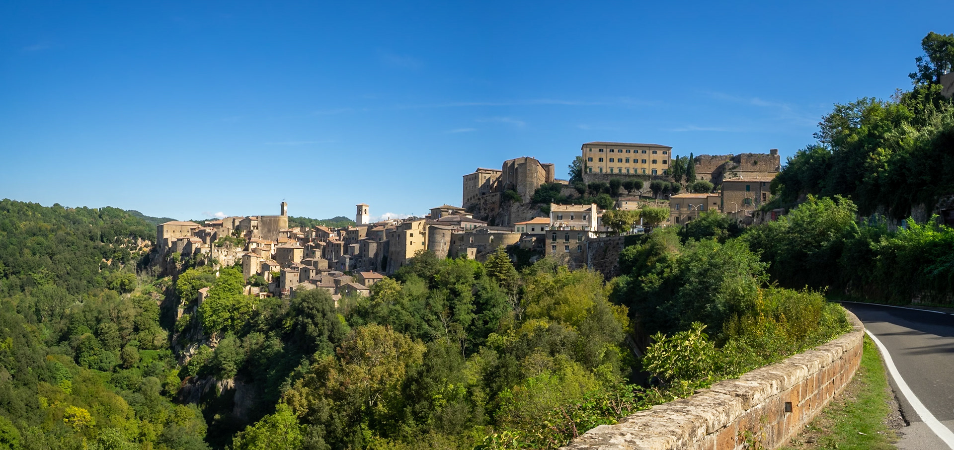 Panorama of Sorano buildings over the gorge