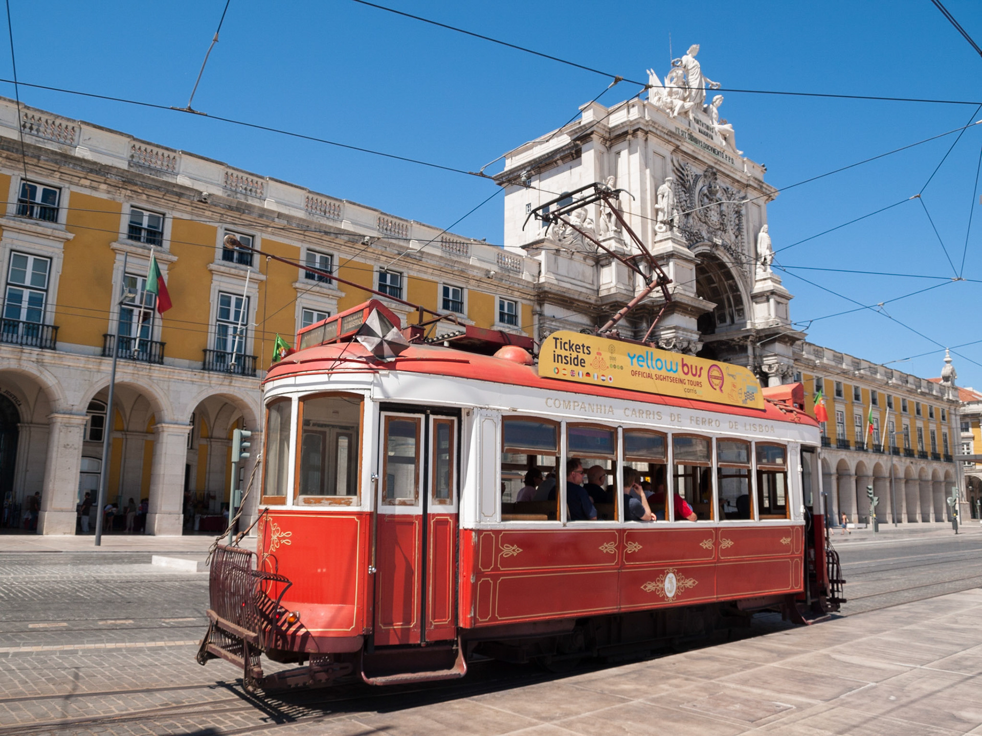 Touristic tram in downtown Lisbon Comercio Square