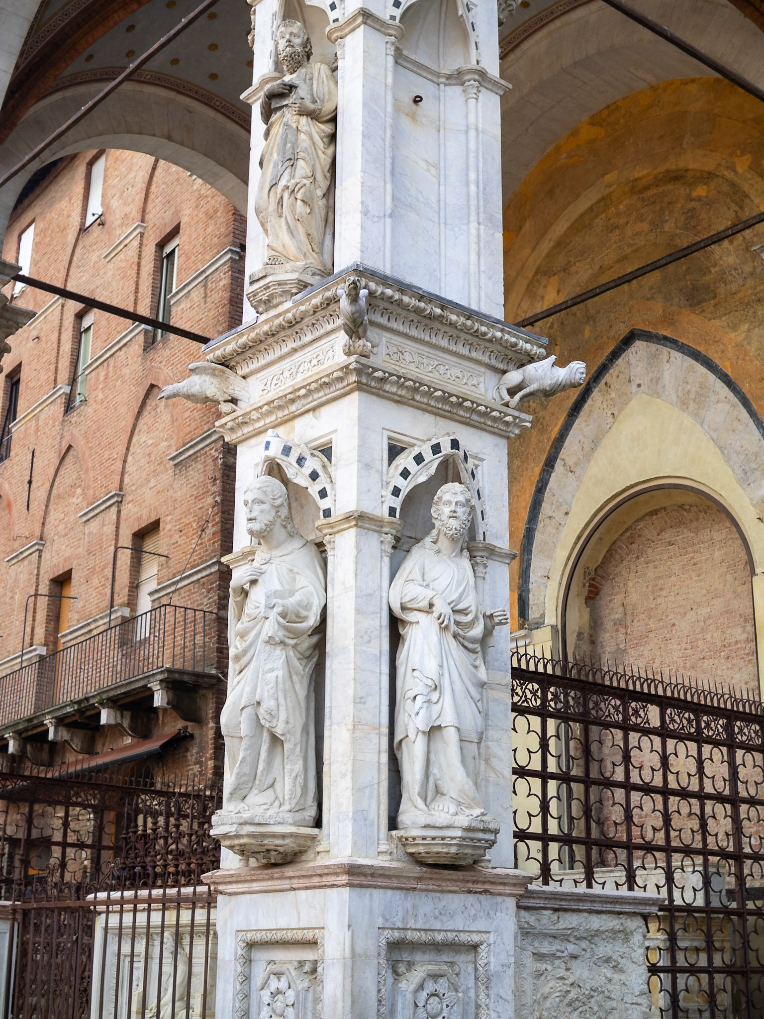 Statues of the Apostles on the columns of Cappella di Piazza, Siena