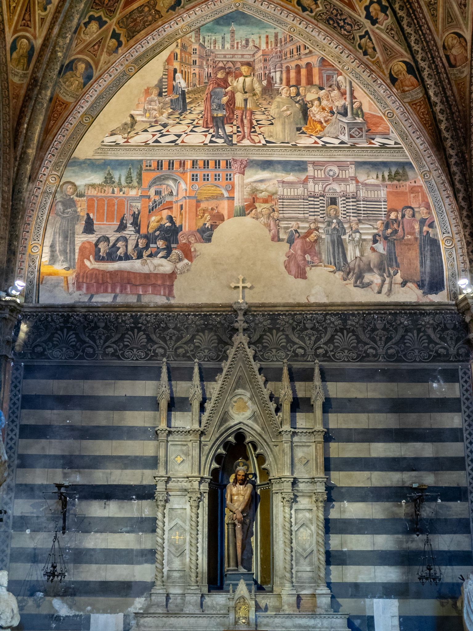 Baptistry of San Giovanni gothic altar dna wall frescos, Siena