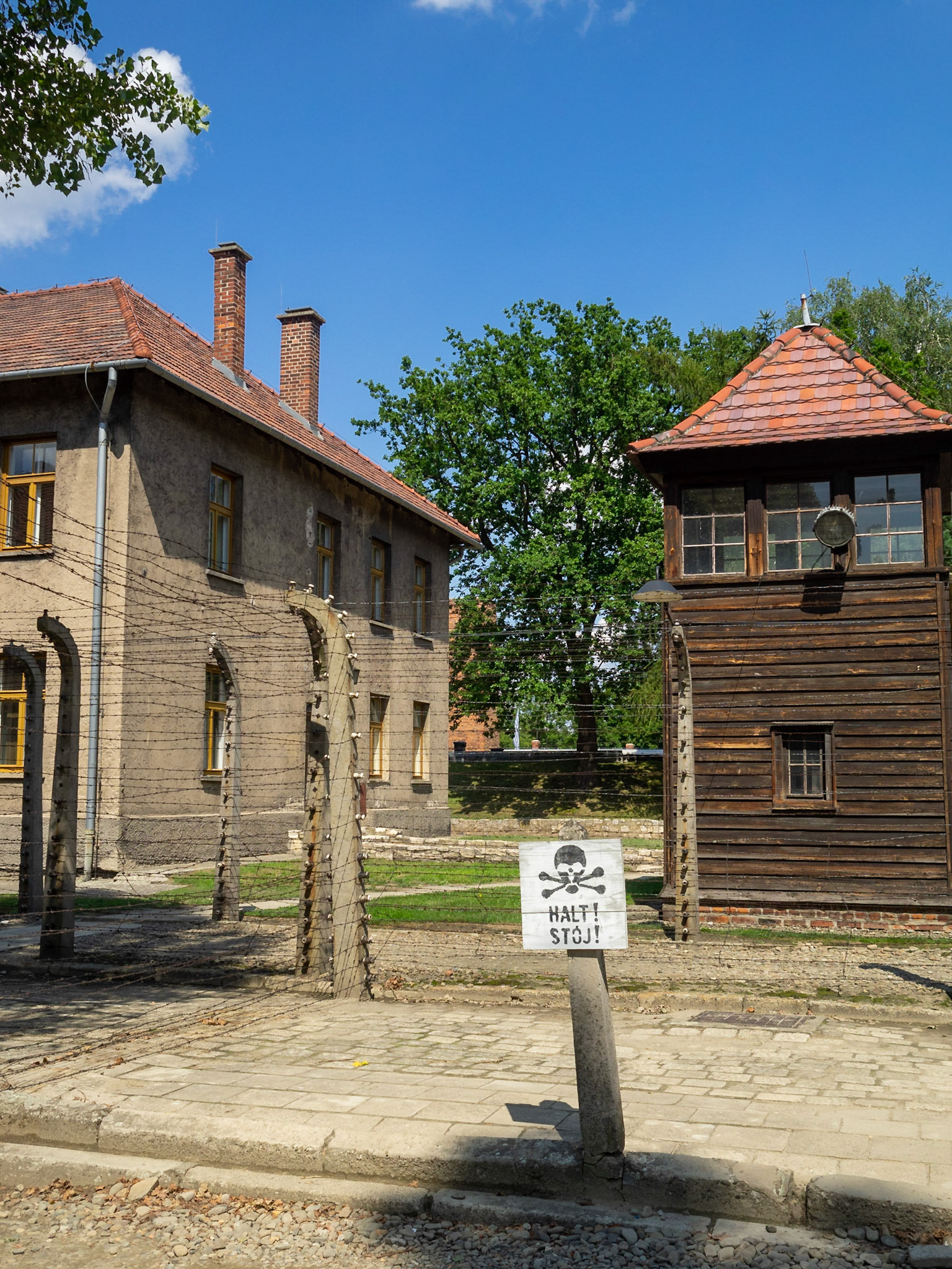 Auschwitz Concentration Camp danger sign by a guard watchtower