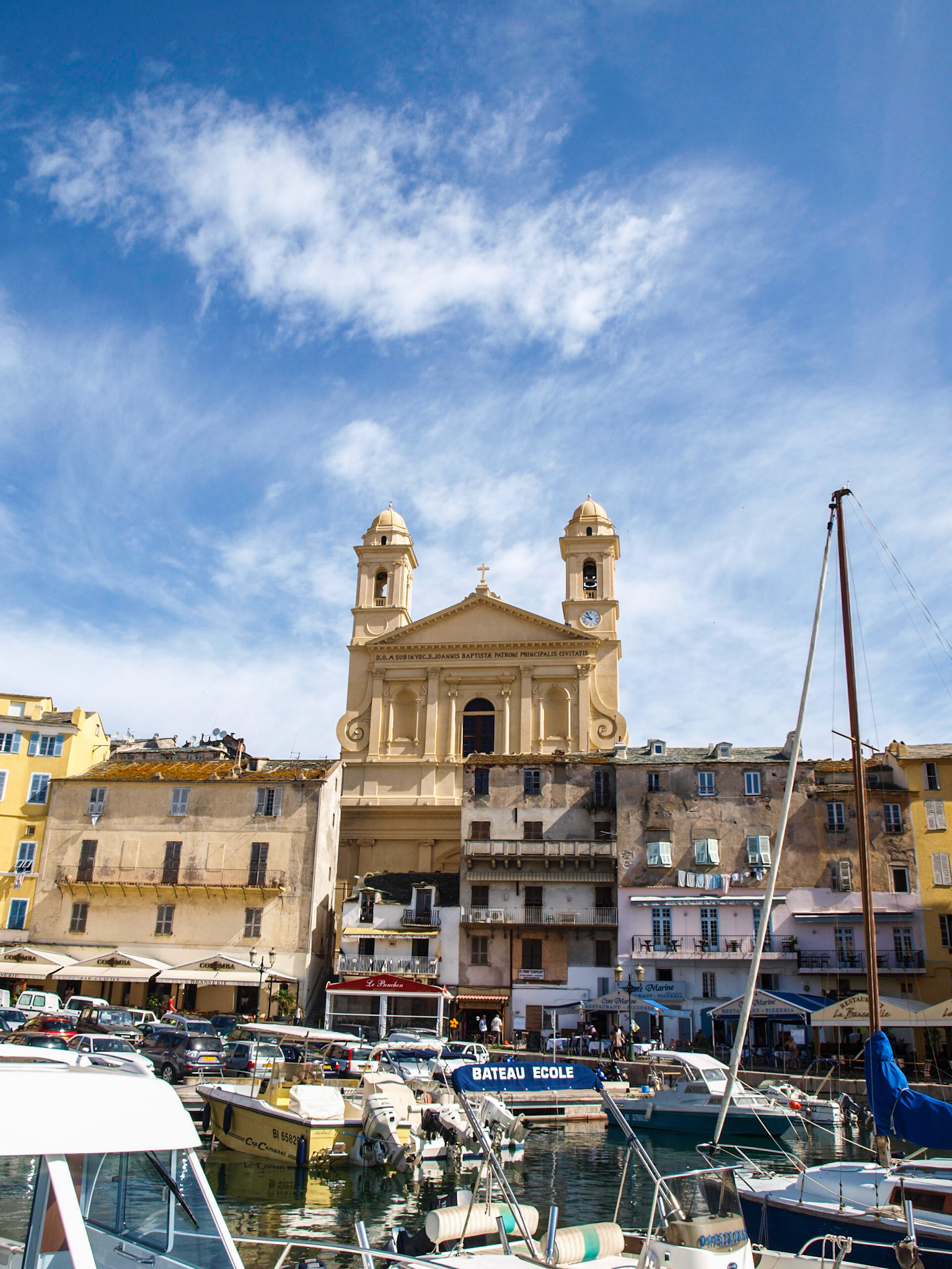 View of Bastia marina with St John Baptist church towers in background