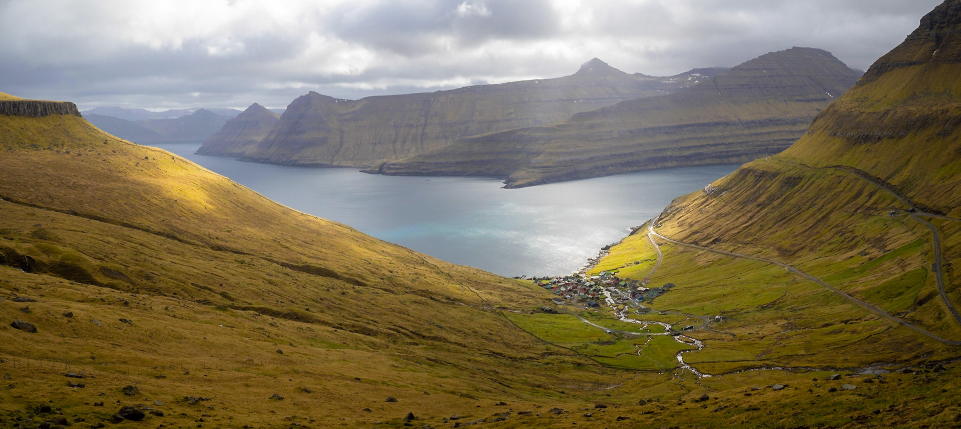 Funningur below Húsafjall with the fjord entrance and Múlin and Sandfelli in background