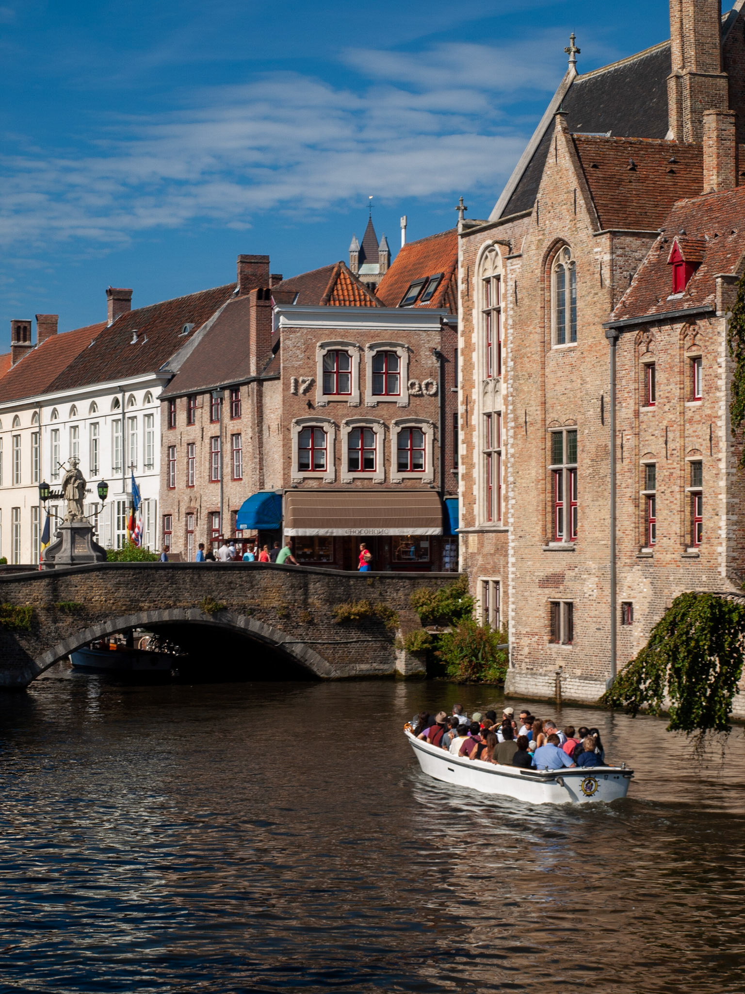 Tourist boat in Bruges canal