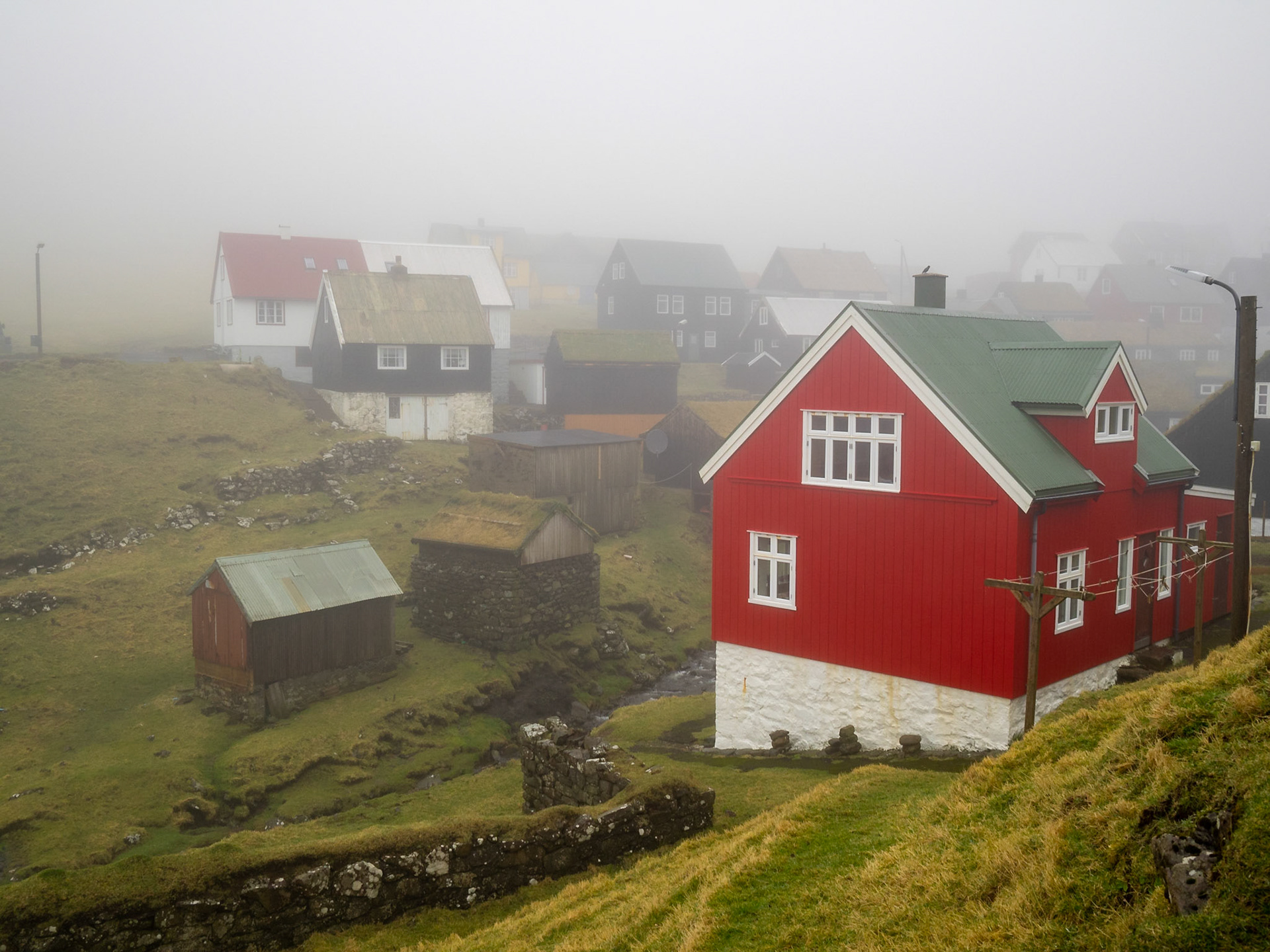 Mykines hamlet in the fog