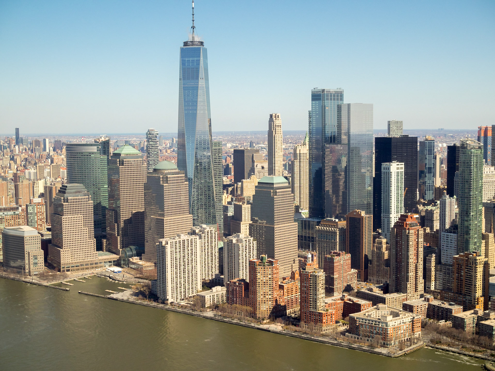 Downtown Manhattan and the 1 World Trade Center tower seen from an helicopter ride over Hudson River