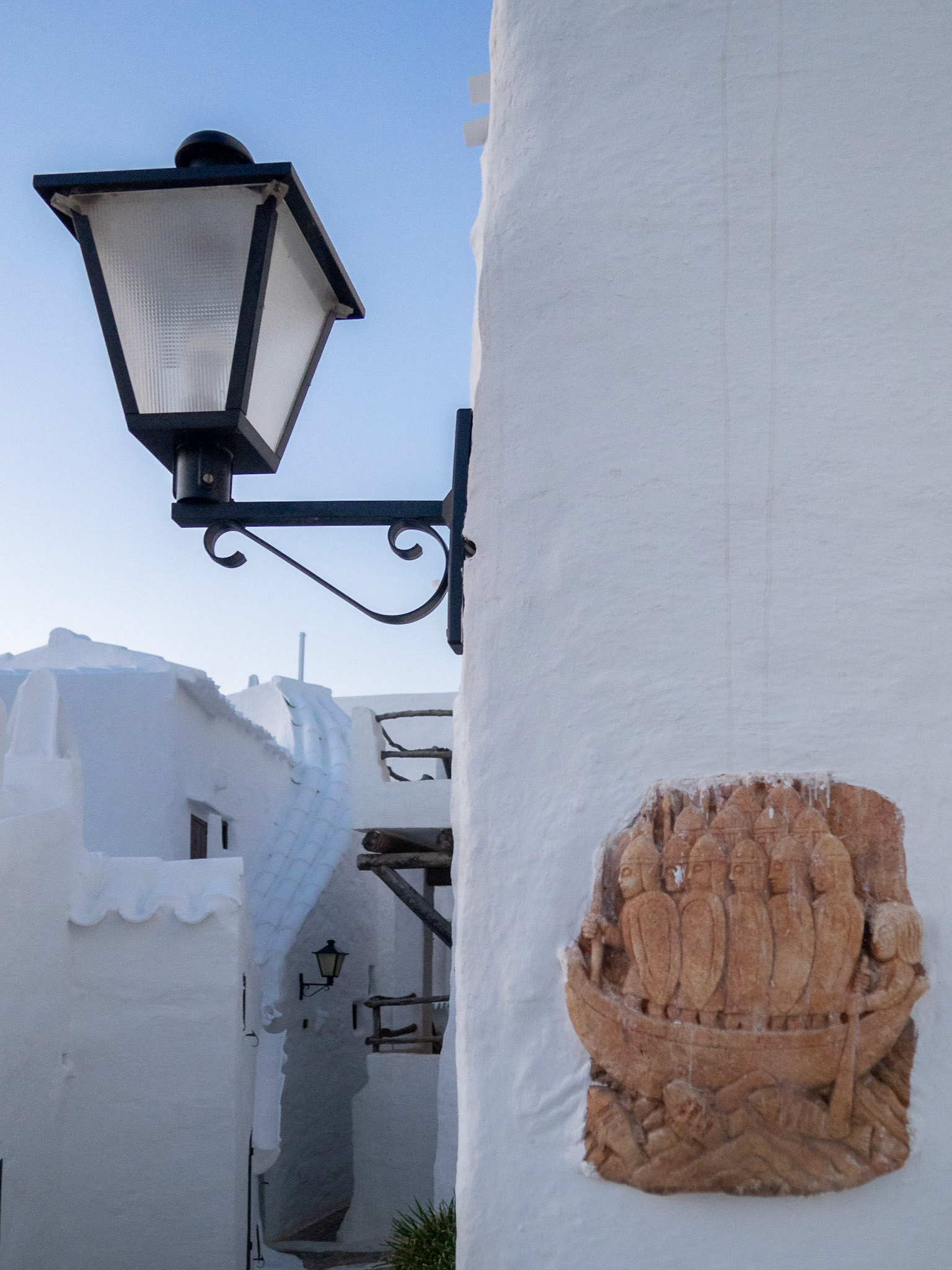 Small stone carving in Binibeca street, Menorca