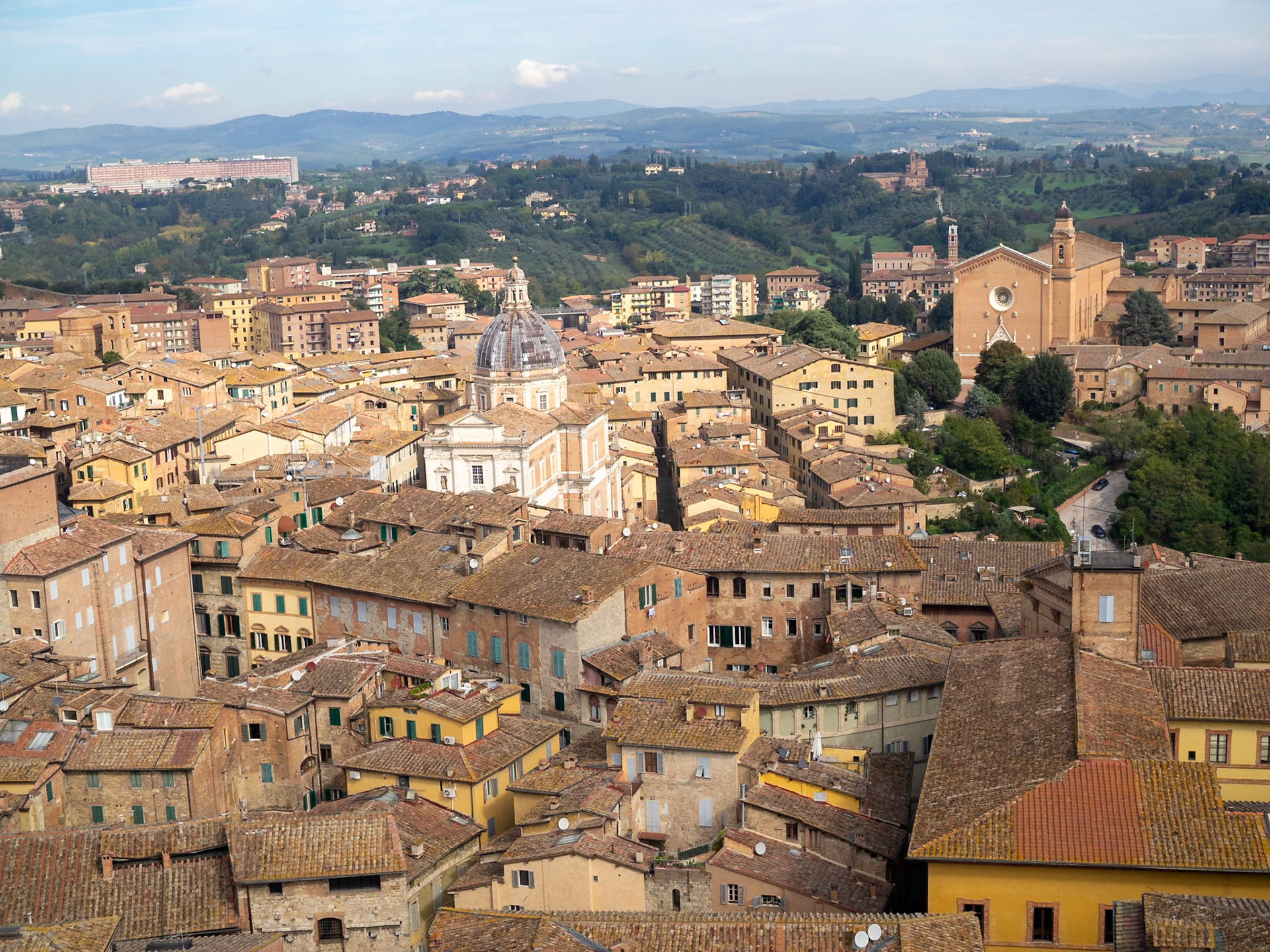 Siena roofs and the countryside from the top of Torre del Mangia