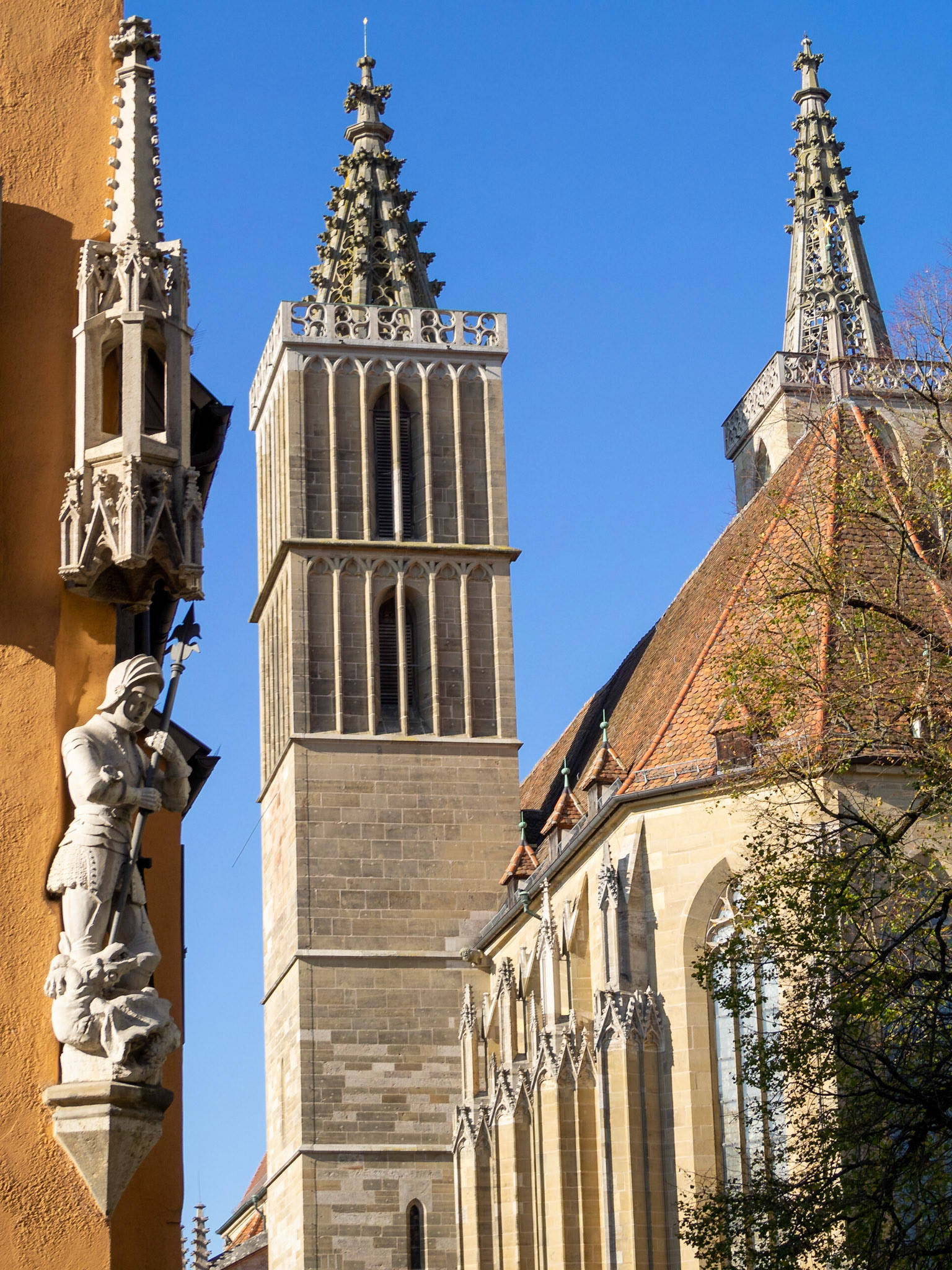 Rothenburg ob der Tauber St. Jakob Church and an image of St. George and the Dragon in a building corner