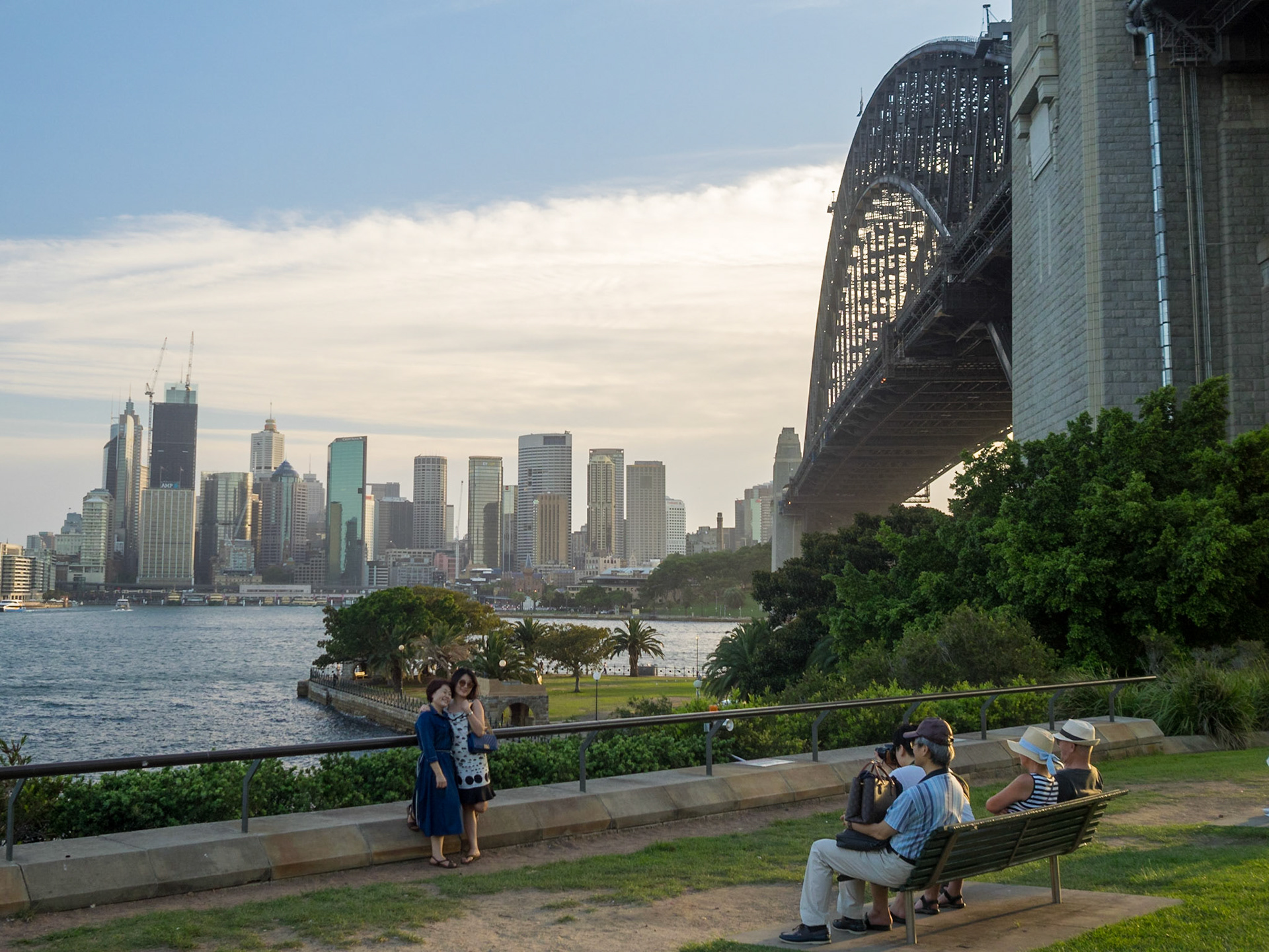 Tourists taking pictures in Milsons Point with Sydney CBD in background