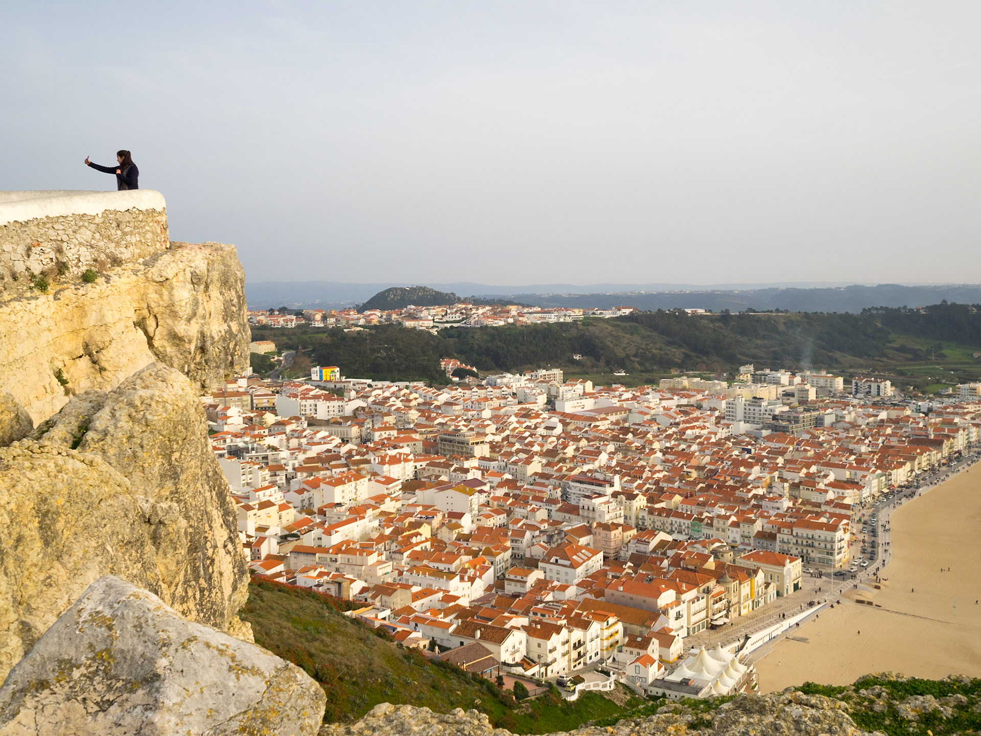 Taking selfies over the cliffs of Nazare