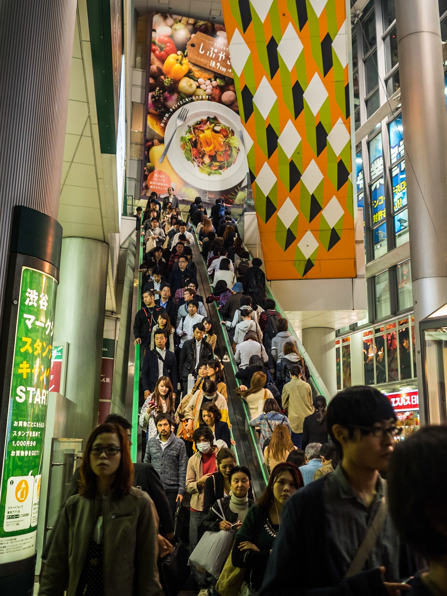 Crowd in Shibuya railway station escalator