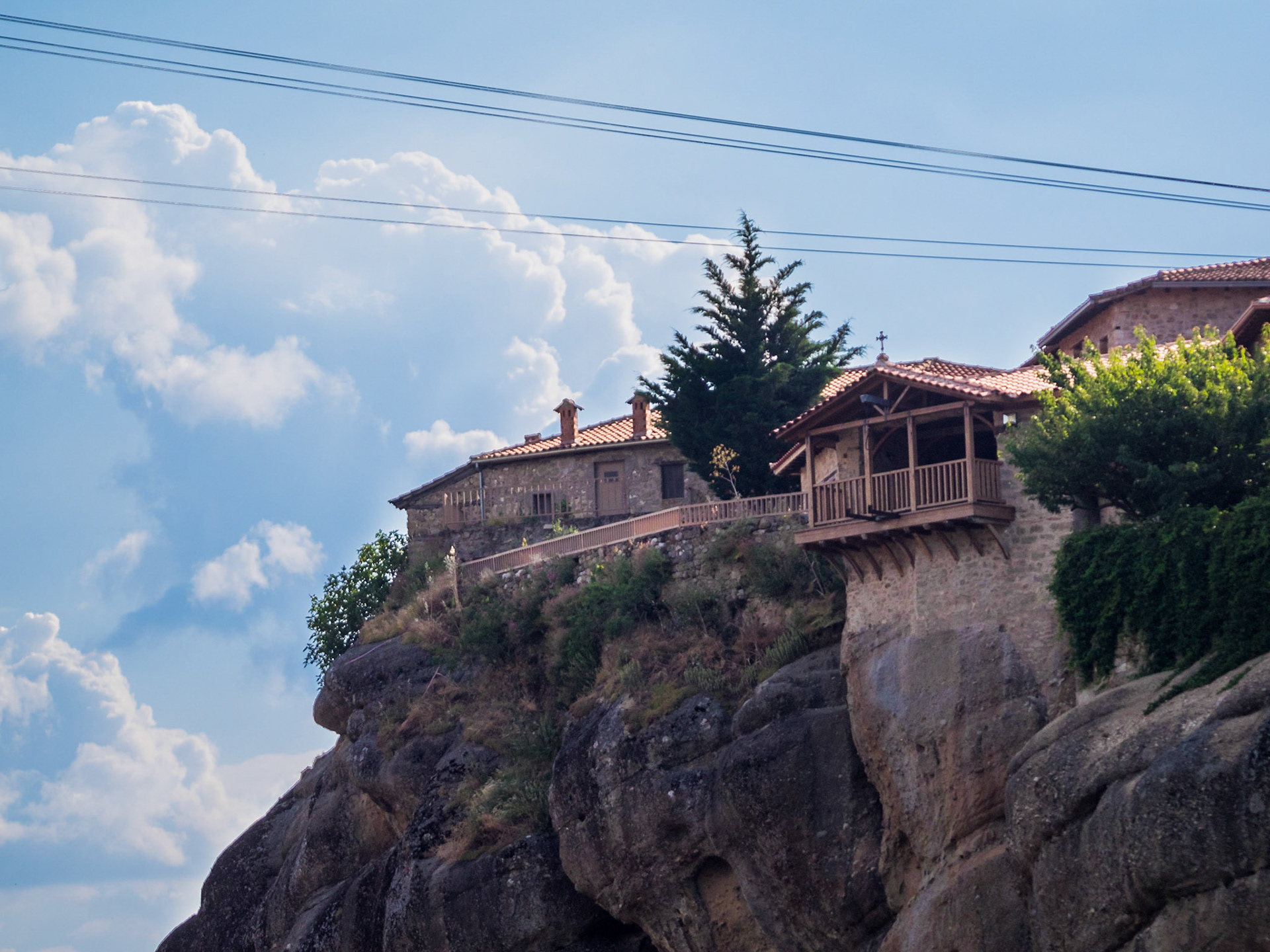 Holy Trinity Monastery wooden balconies atop the rocks