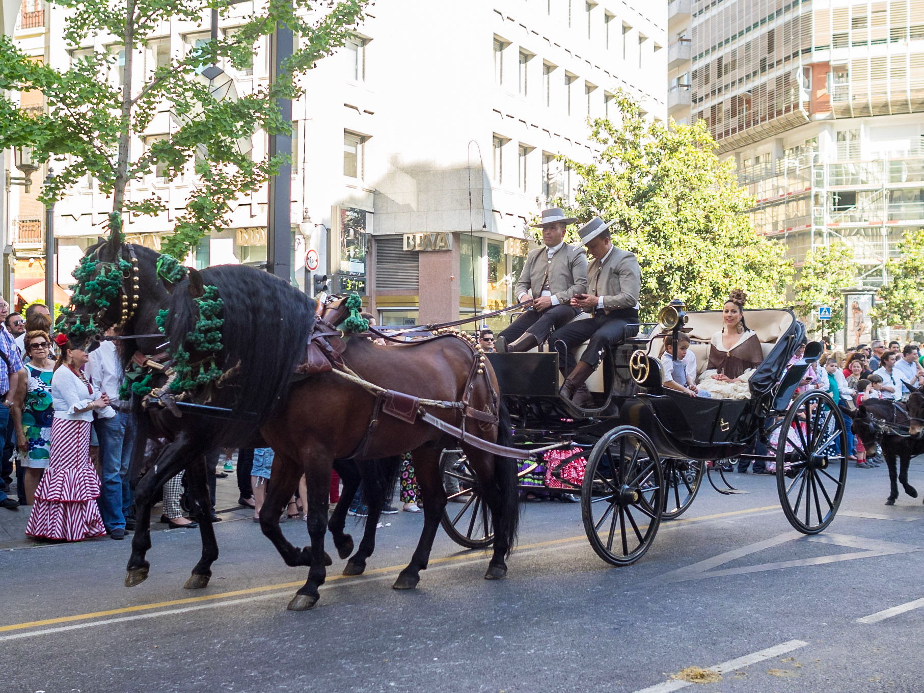 Street parade during the Las Cruces de Mayo in Granada