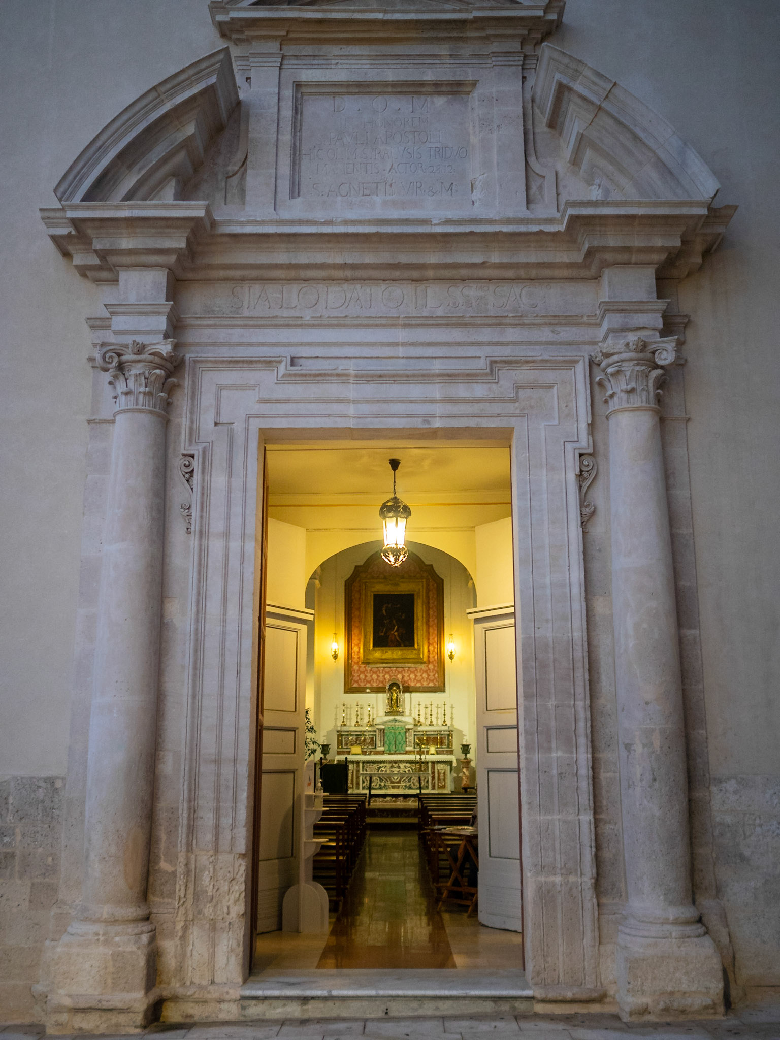 Chiesa San Paolo Apostolo with open doors at night