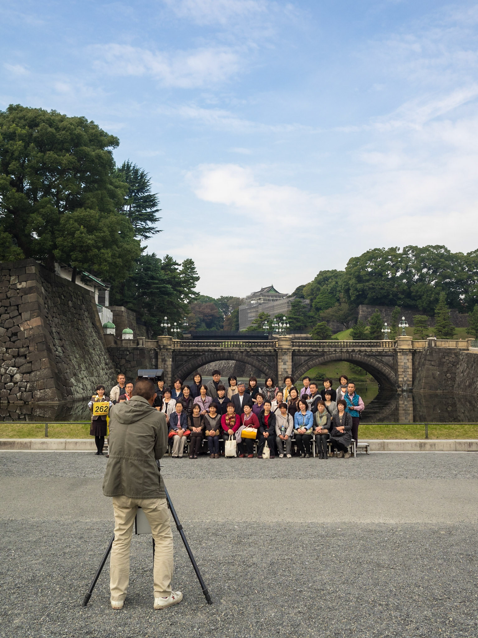 Tourist group taking pictures near Tokyo Imperial Palace