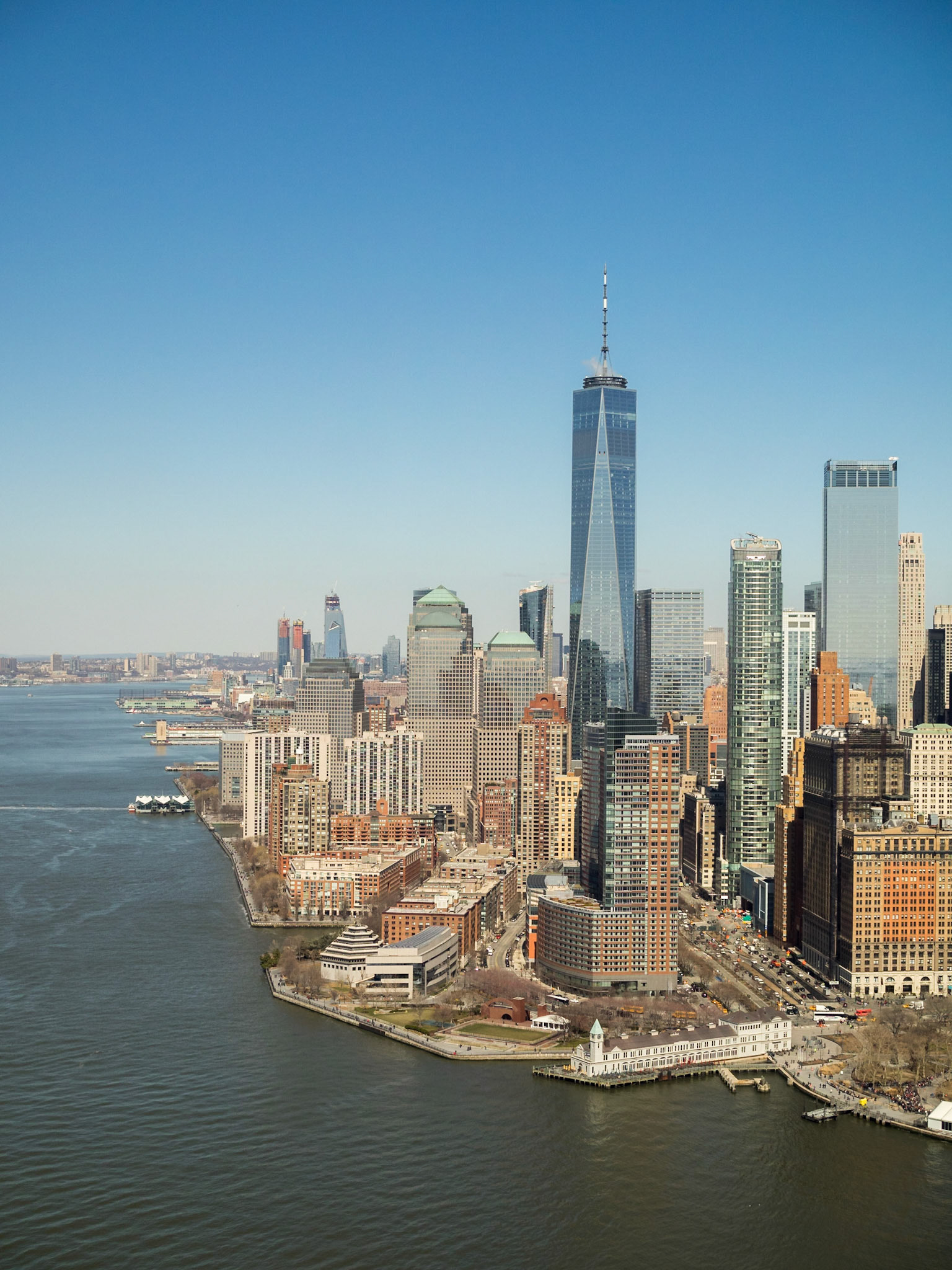 Downtown Manhattan and the 1 World Trade Center tower seen from an helicopter ride over Hudson River