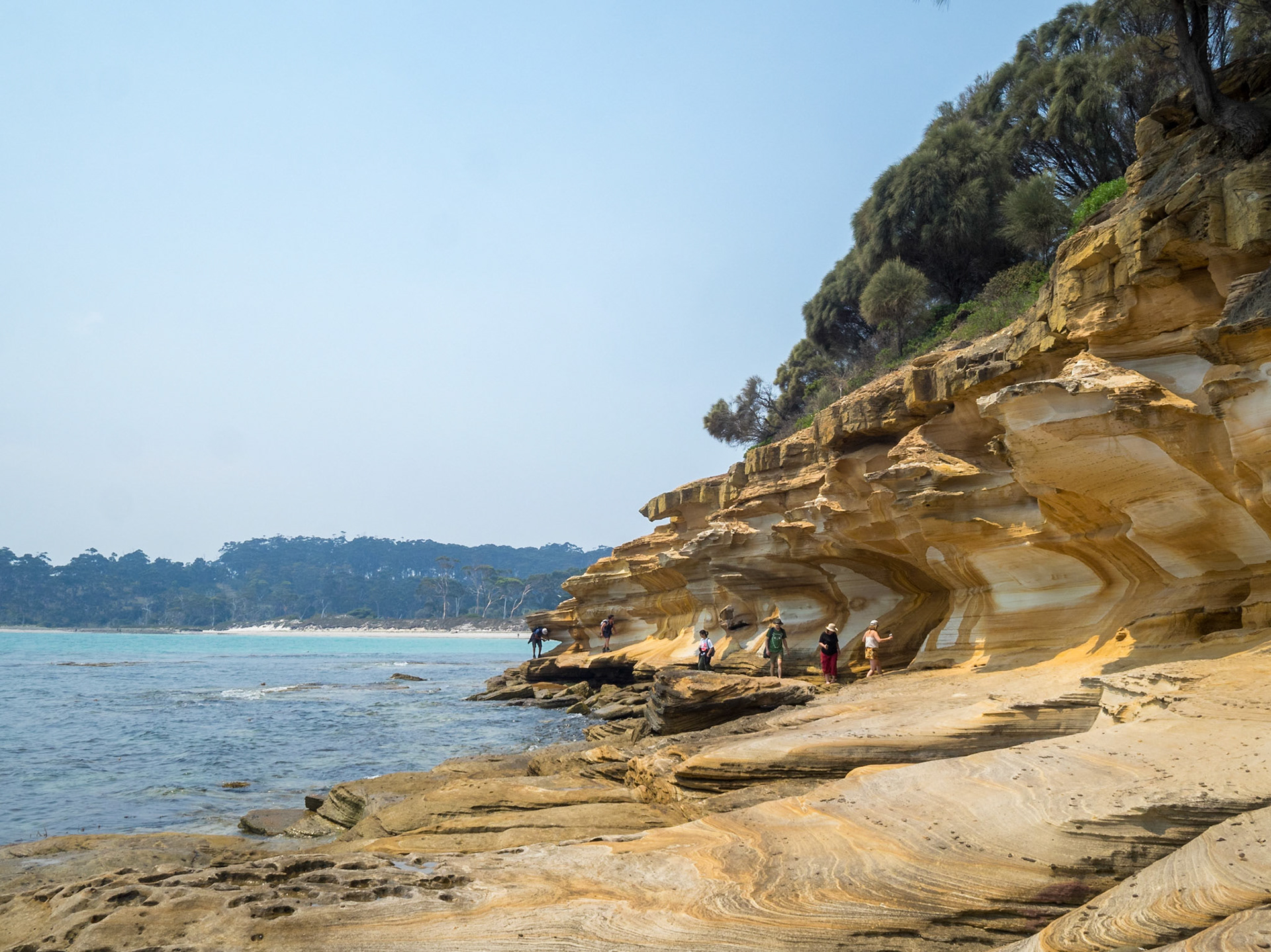 People asking along Maria Island Painted Cliffs