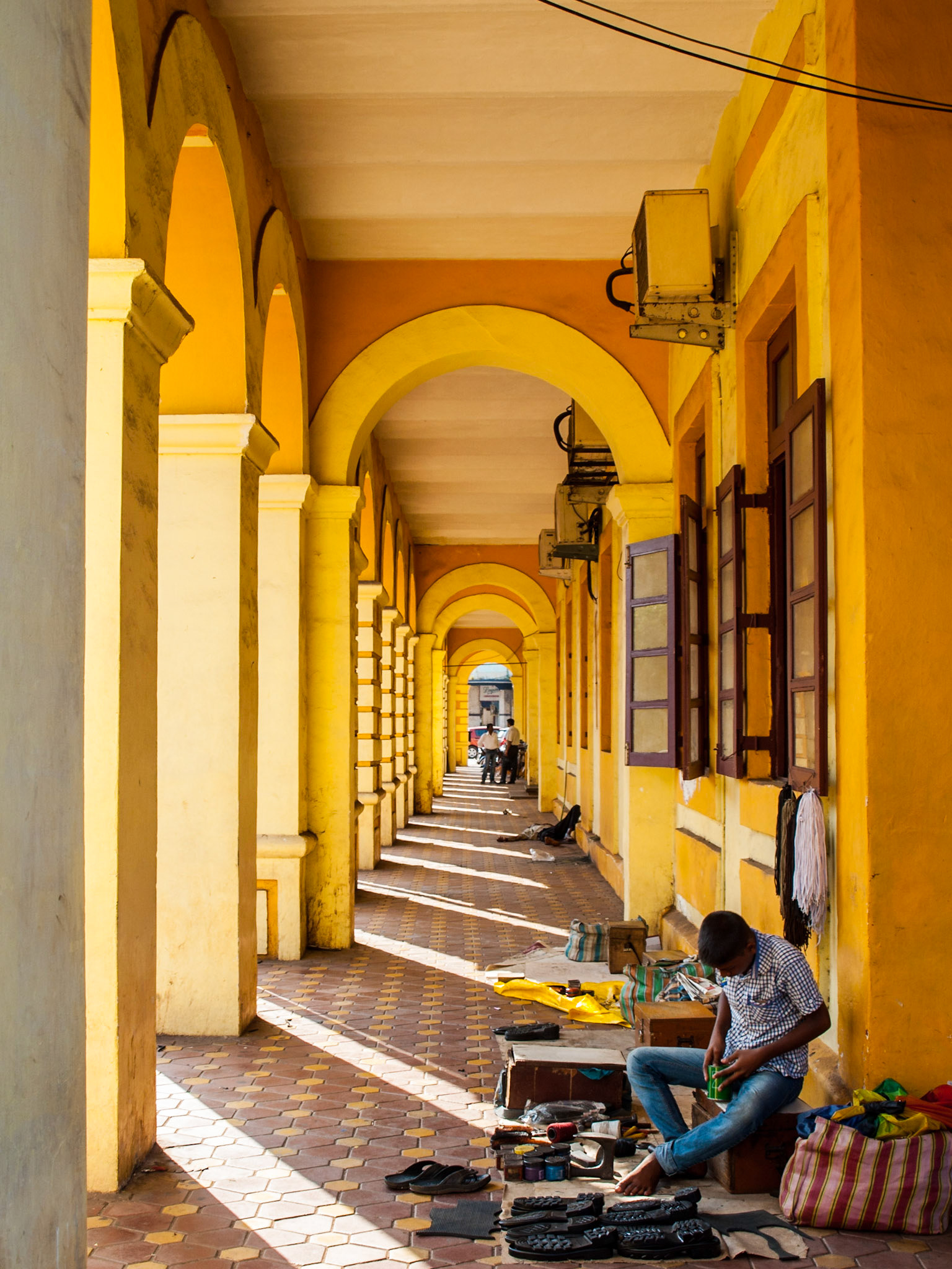 Archway painted in yellow in Madgao city council building