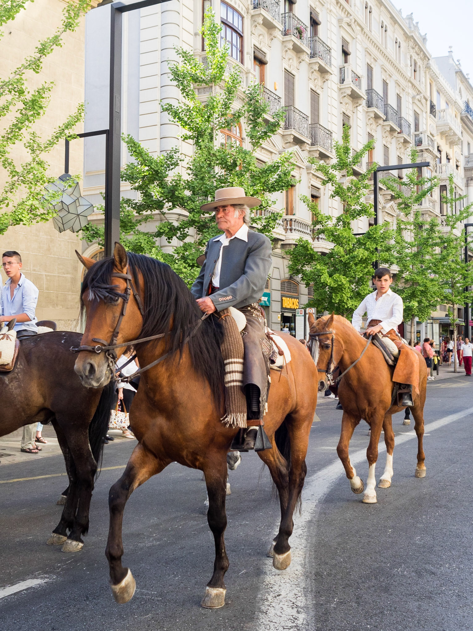 Street parade during the Las Cruces de Mayo in Granada