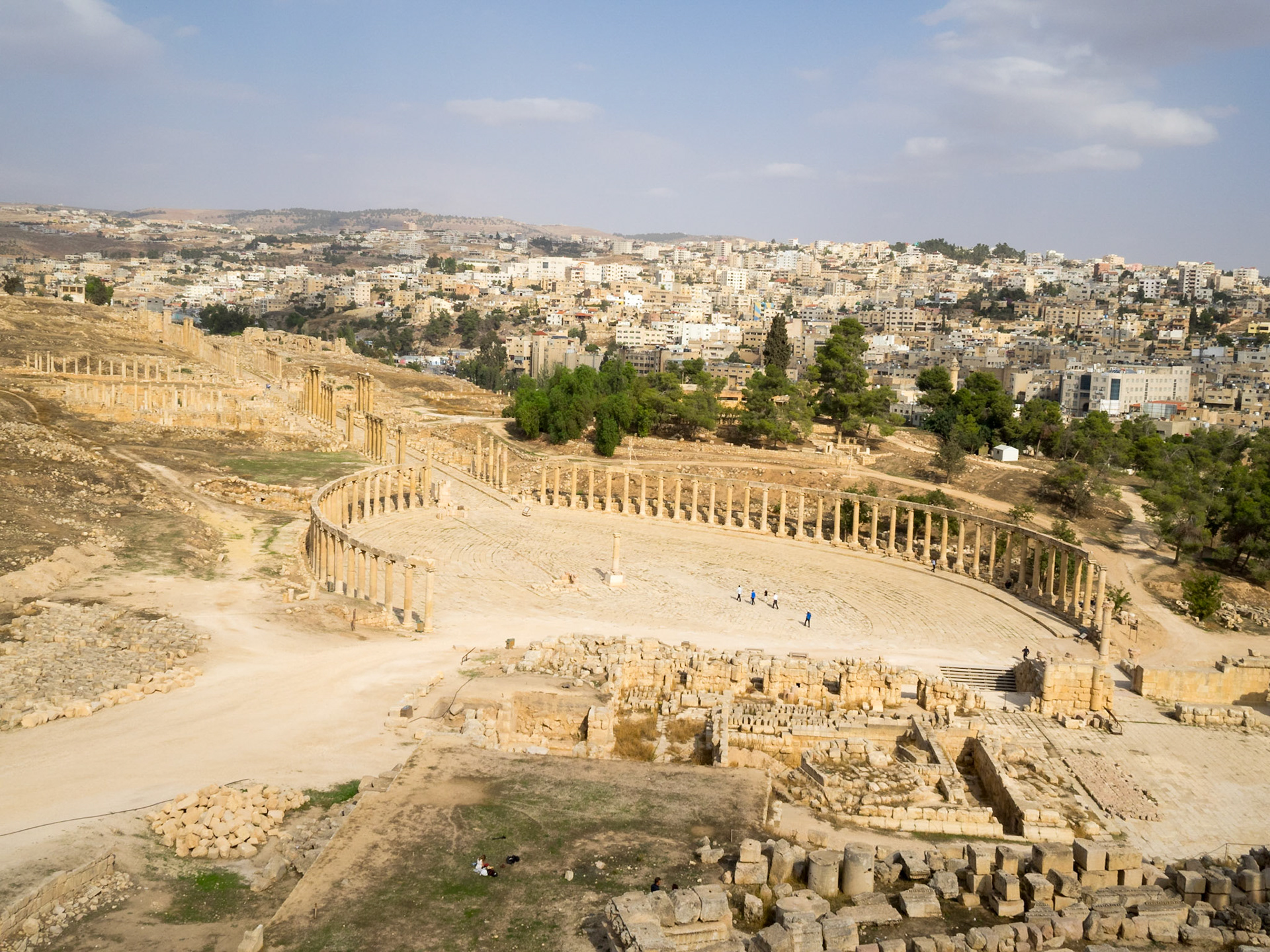 Oval Forum and Cardo of Jerash Roman city with the new city in background