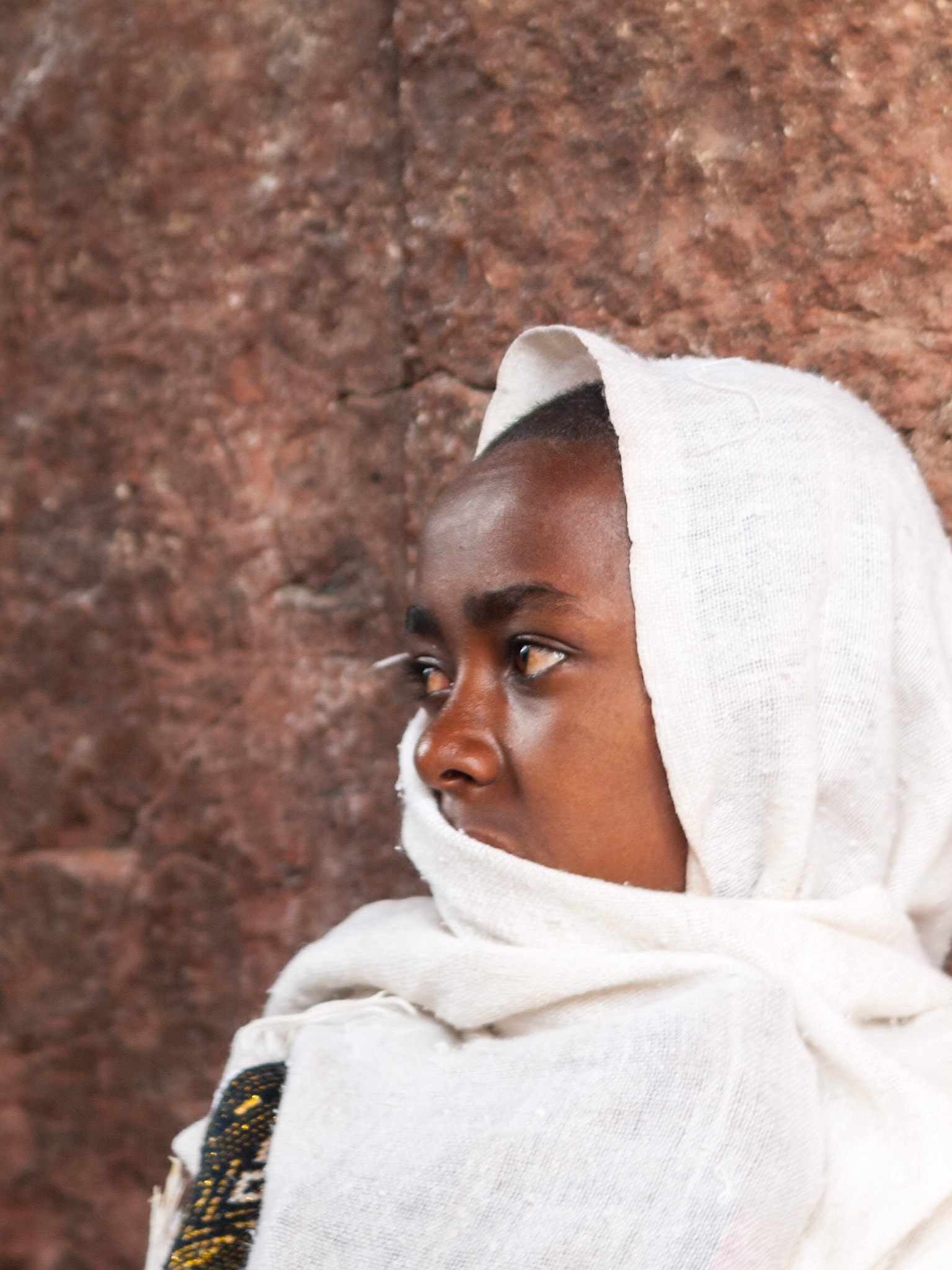 Portrait of pilgrim outside church in Lalibela during Easter