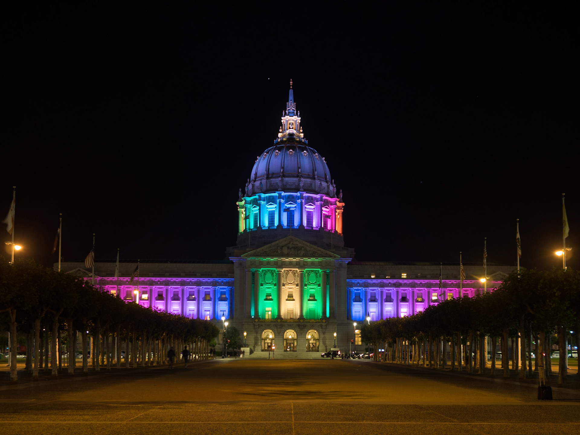 San Francisco City Hall illuminated in Pride colors for the 2016 Pride Parade