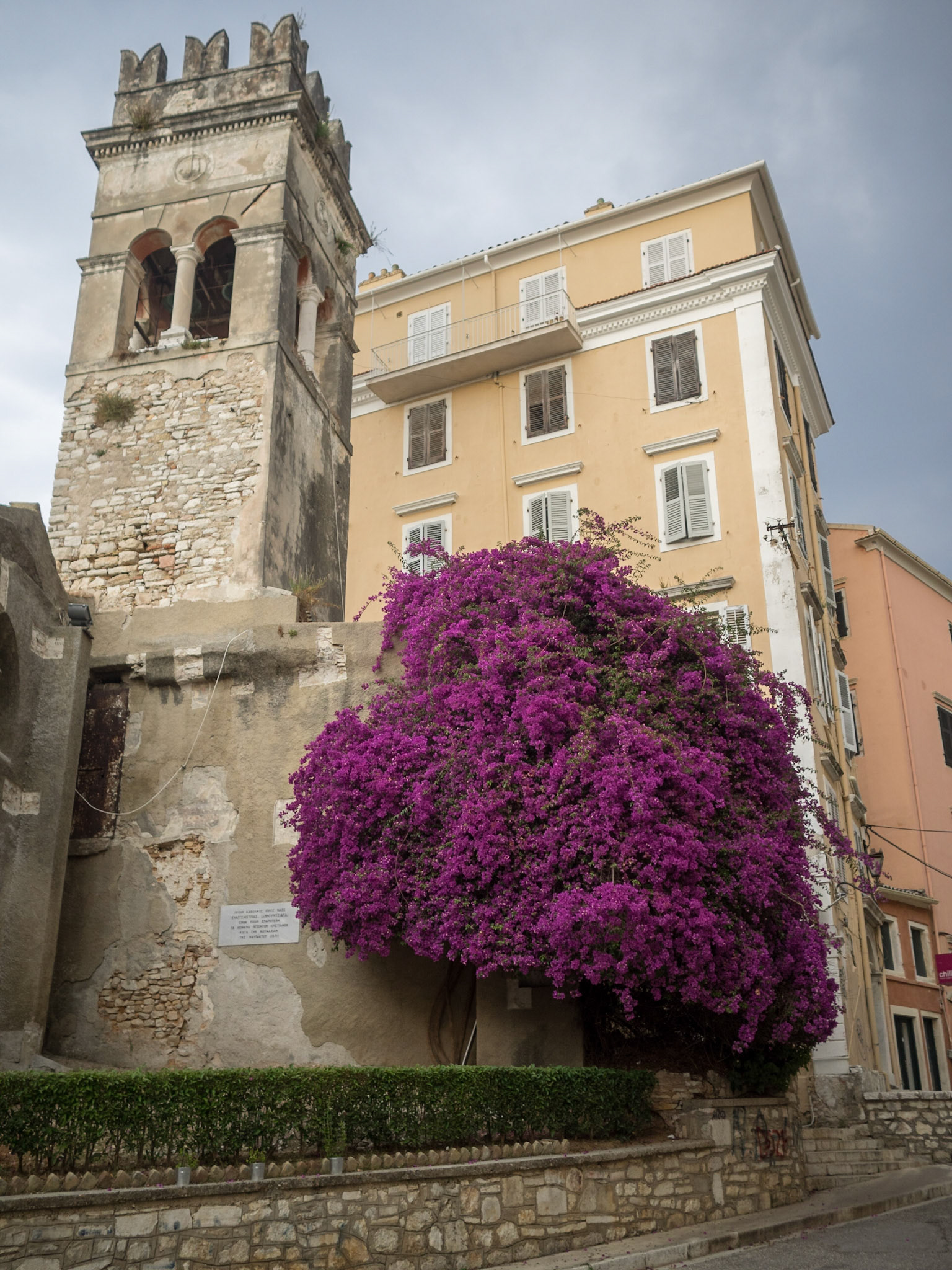Corfu town street with old tower