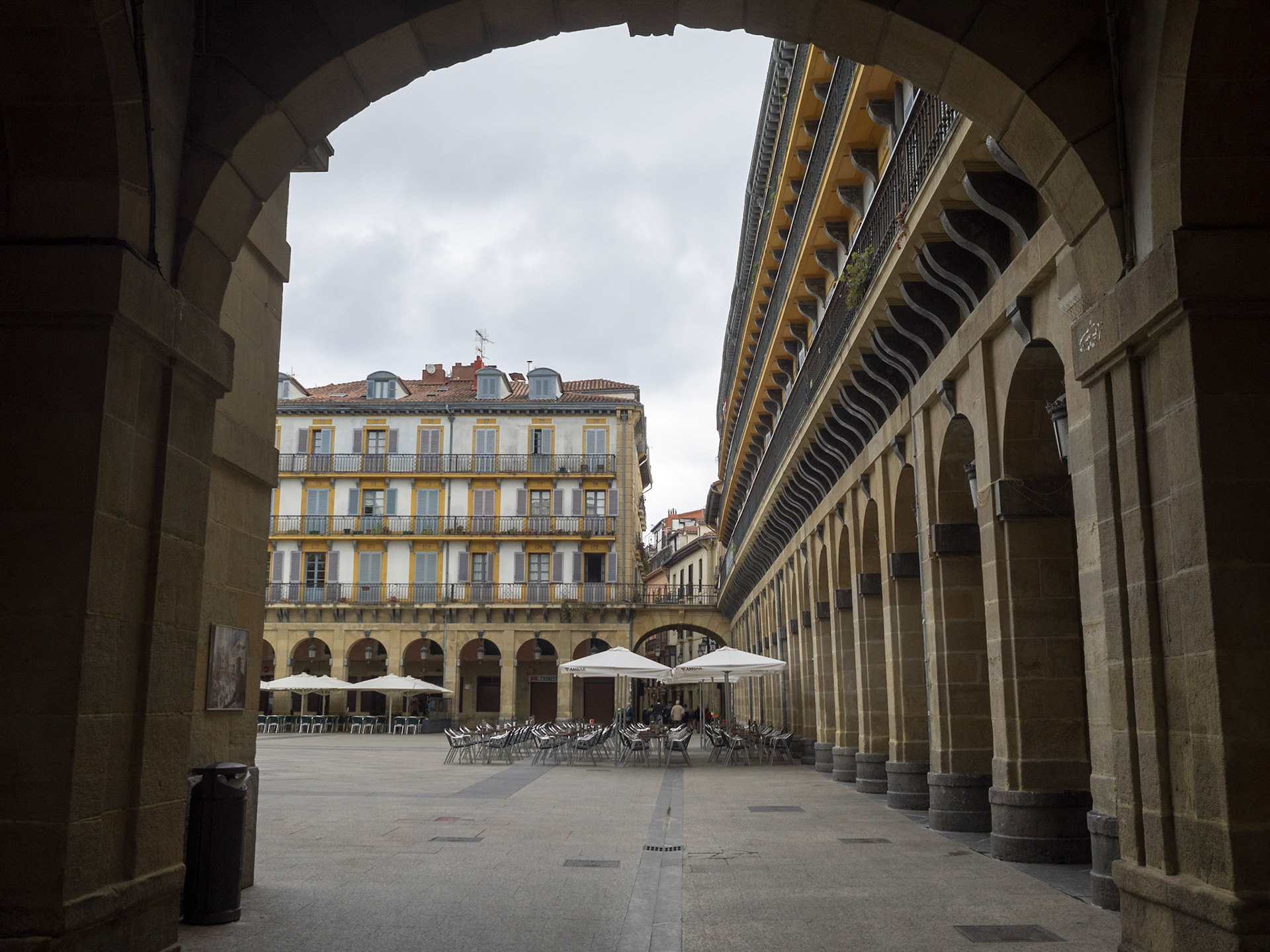 San Sebastian Constitution Square seen from bellow the archs