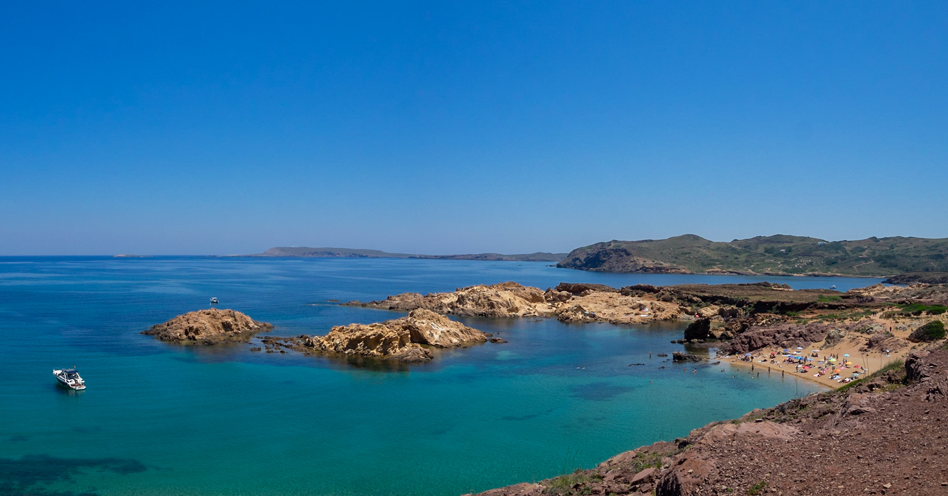 Turquoise waters and small coves of Cala Pregonda, Menorca