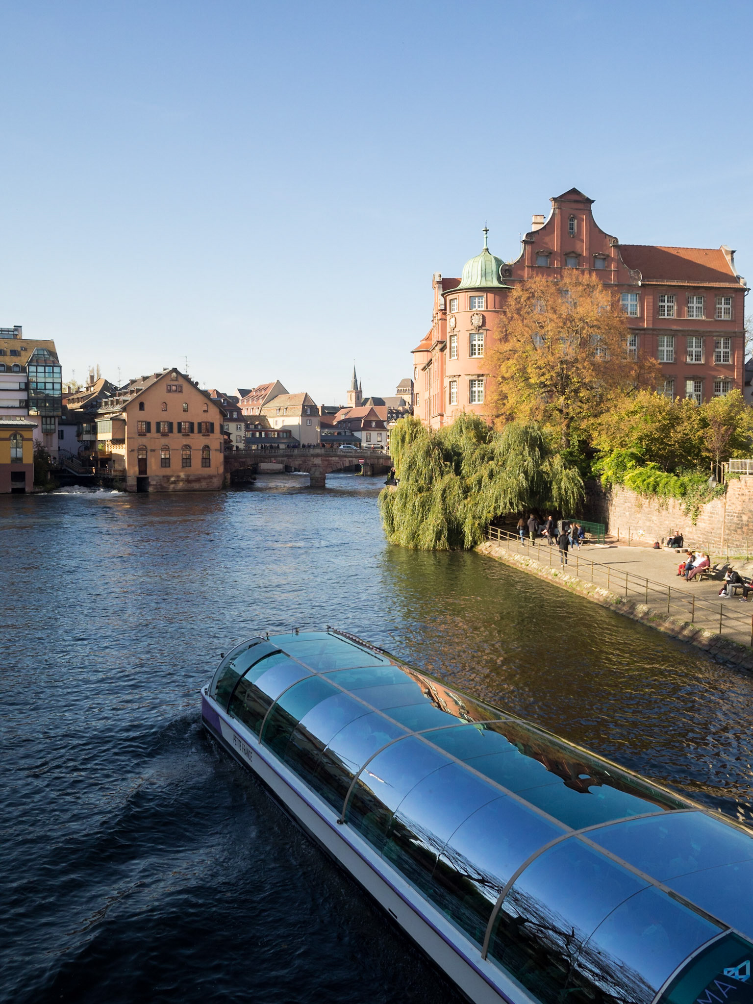 Tourist boat travelling Ill River in Strasbourg
