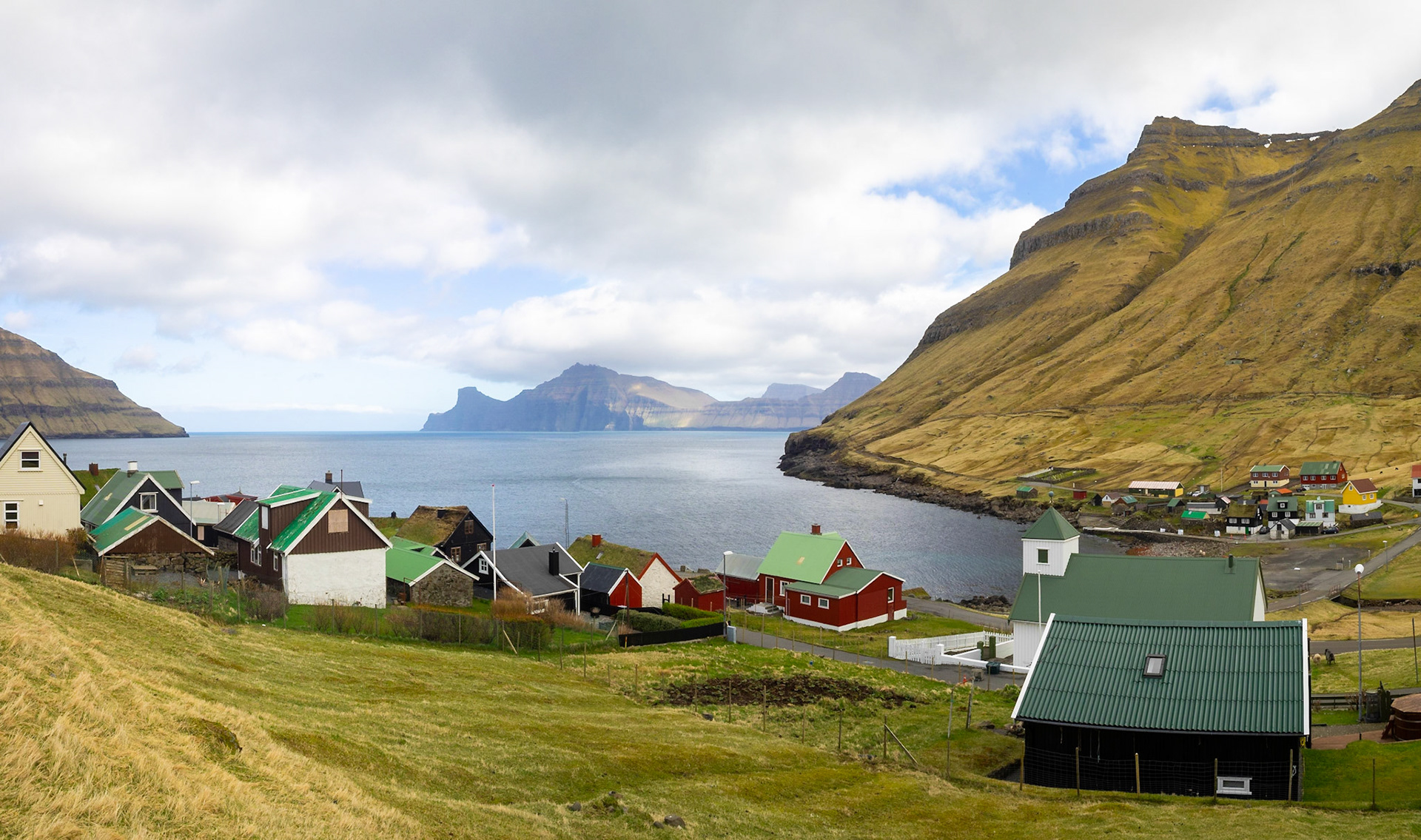 Elduvík village below Skoratindur mountain