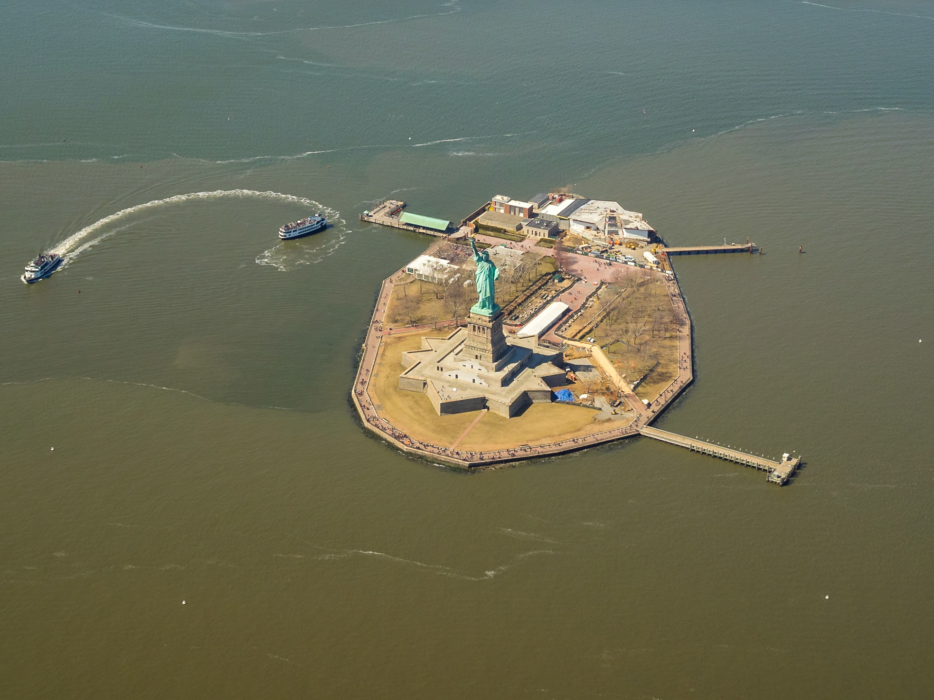 The Statue of Liberty seen from an helicopter ride over New York Bay