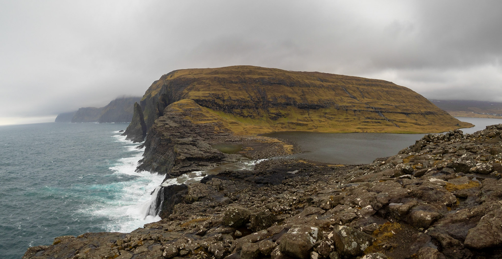 Bøsdalafossur waterfall of Leitisvatn lake to the ocean