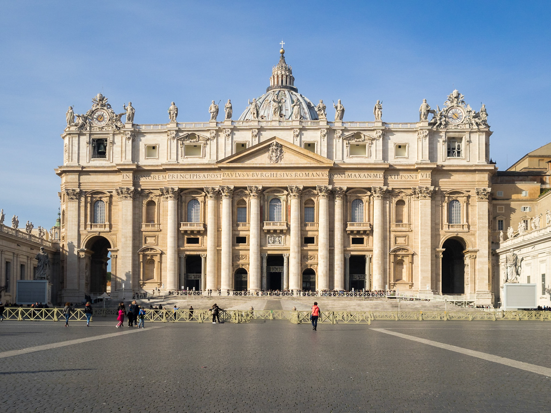 An empty St. Peter's Square with the Basilica at the end