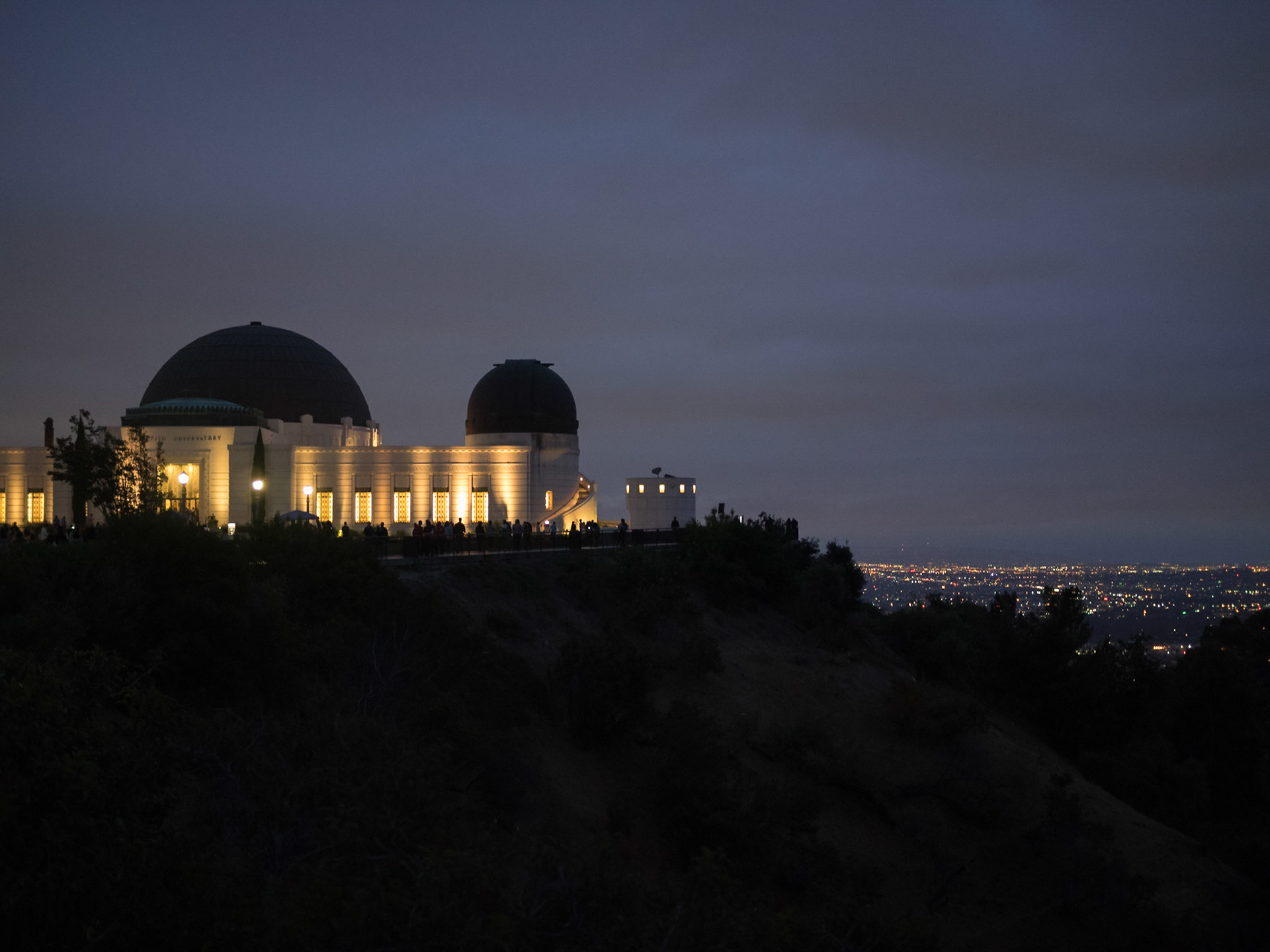Griffith Observatory on top of the mountain overlooking Los Angeles at night