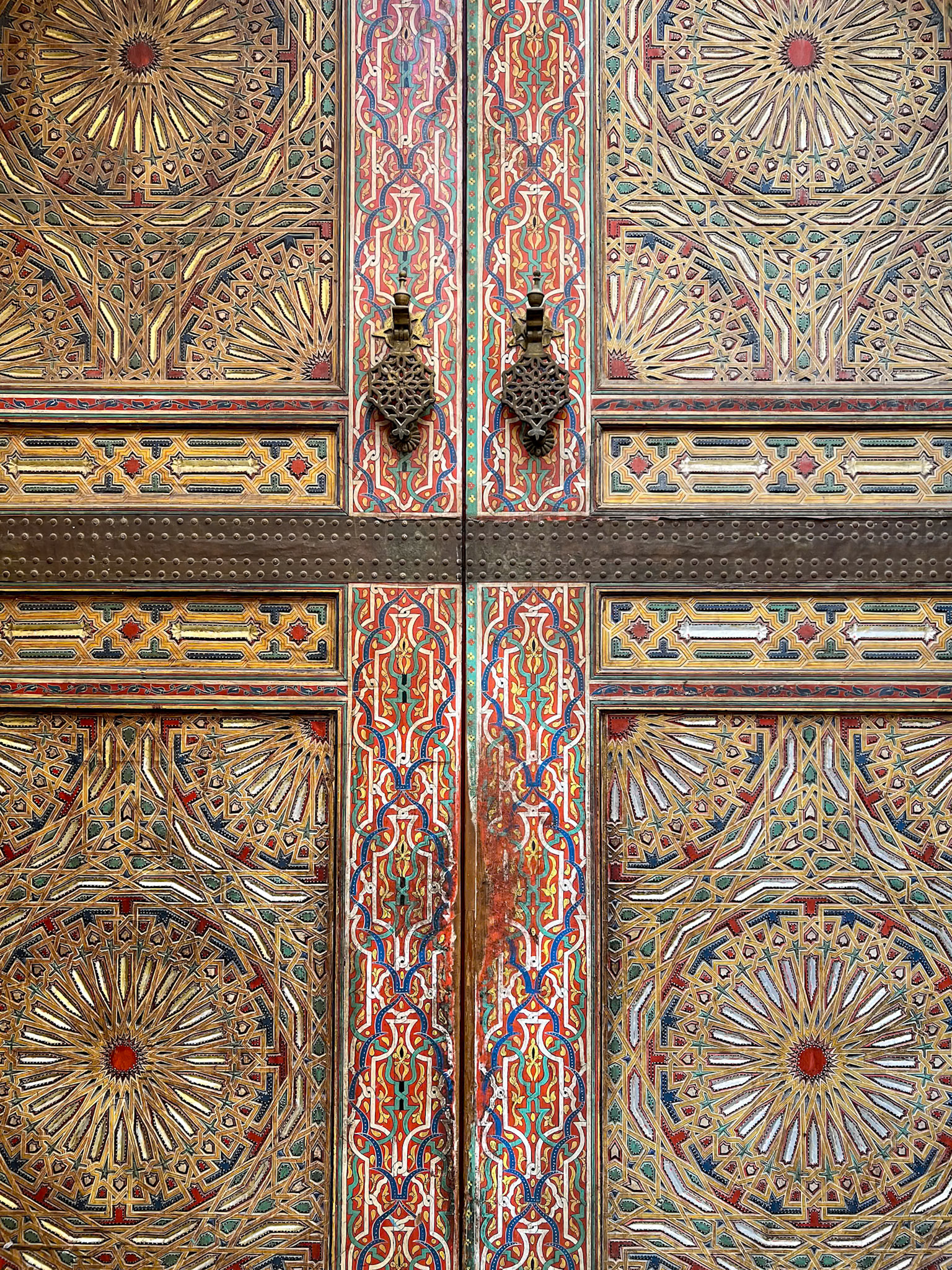 Painted wooden doorway detail, Fez, Morocco