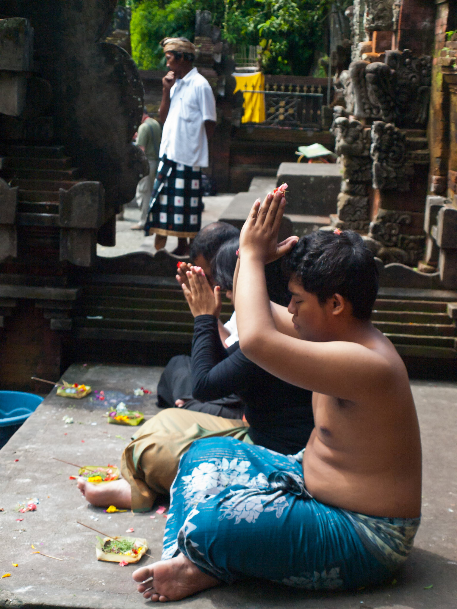 Hindu pilgrims inside Pura Tirta Empul holy water pool