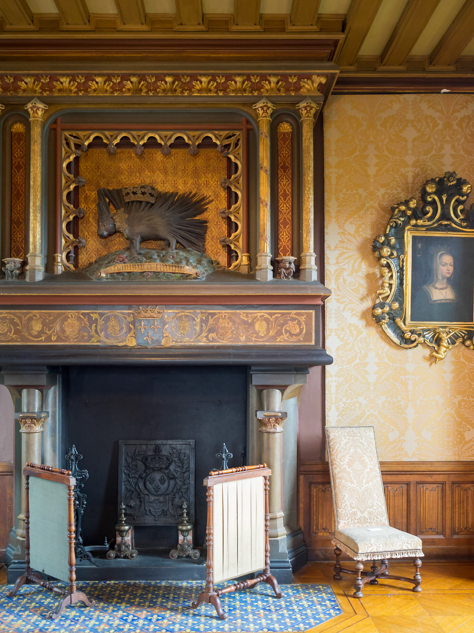 Fireplace tooped by porcupine at Chaumont-sur-Loire Chateau