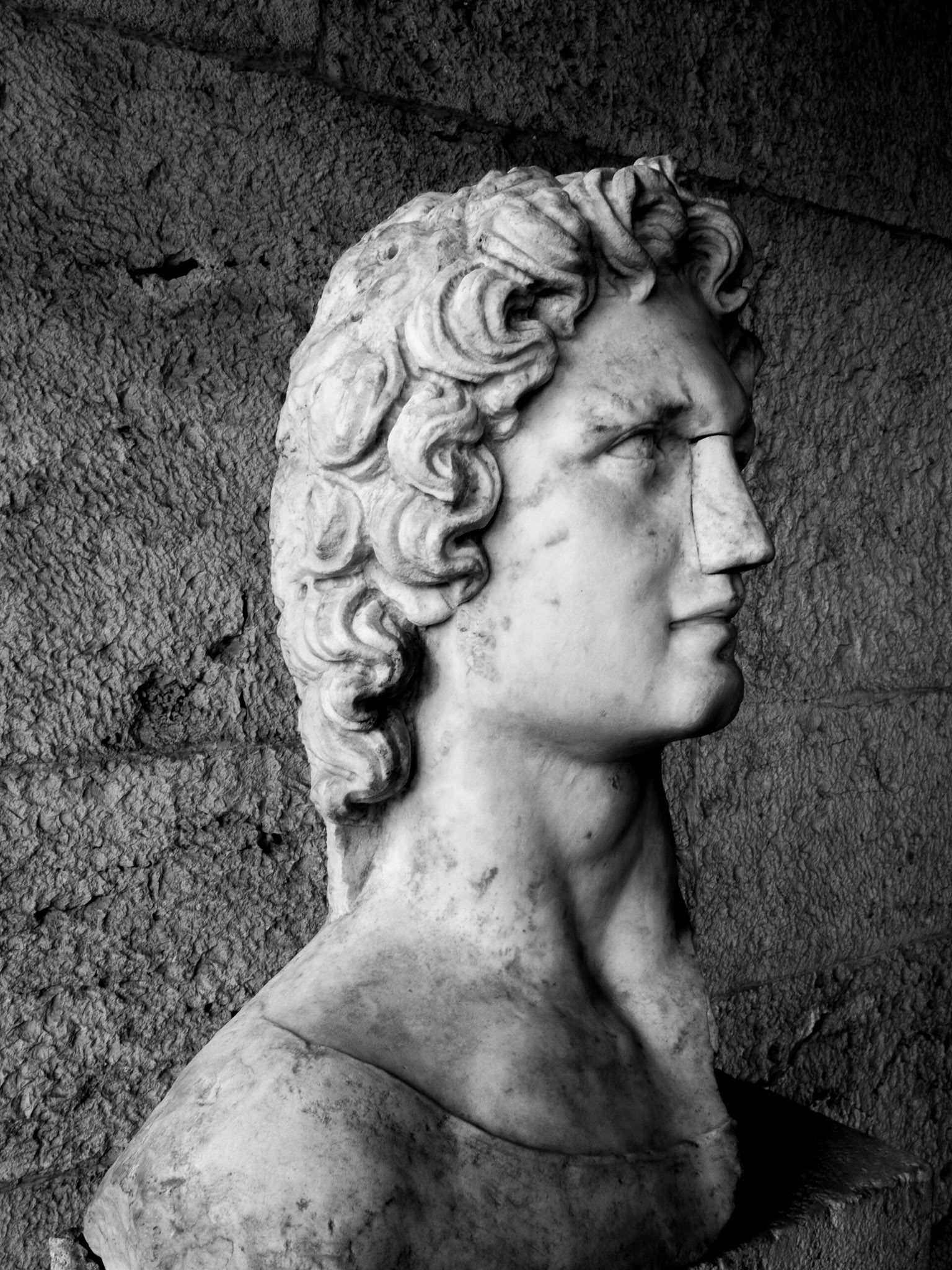 Man head sculpture in the Agora Museum
