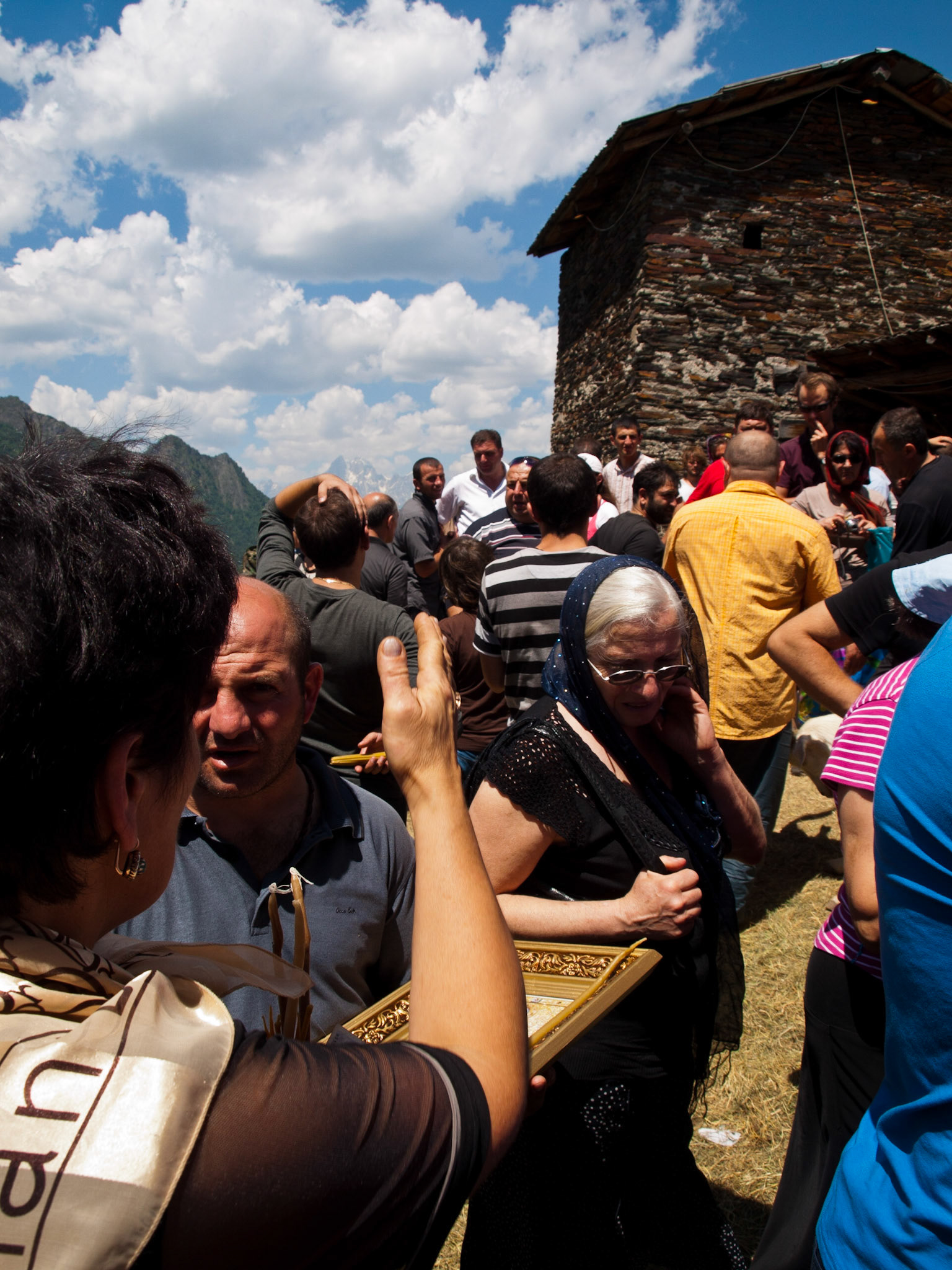 Georgian pilgrims in Lamaria Church, Svaneti, Georgia