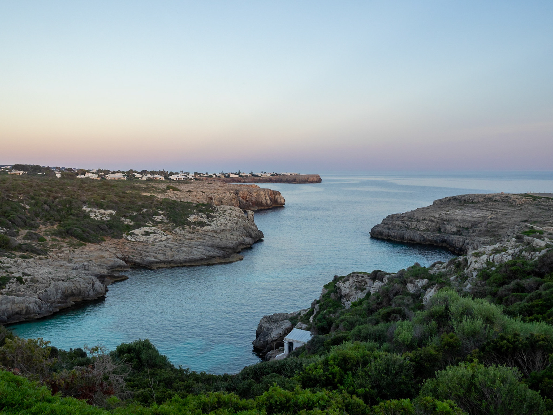 Rocky Cala Binibeca at dusk, Menorca
