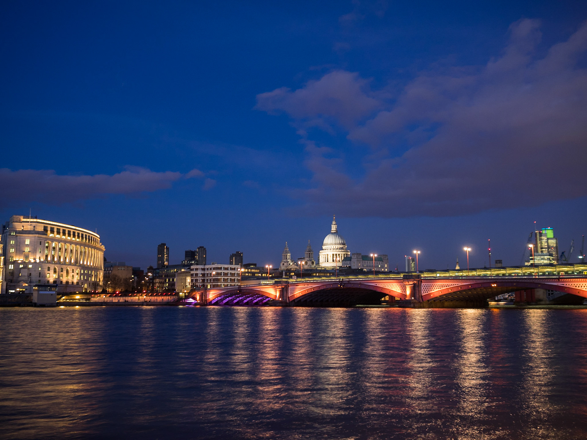 London city lights reflecting in the Thames river