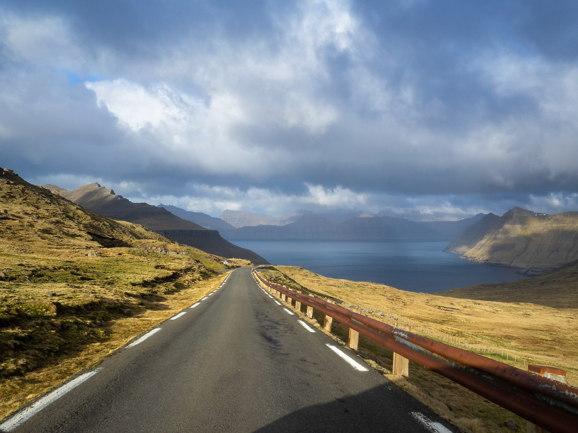 Road going down Slættaratindur mountain to Funningsfjørður