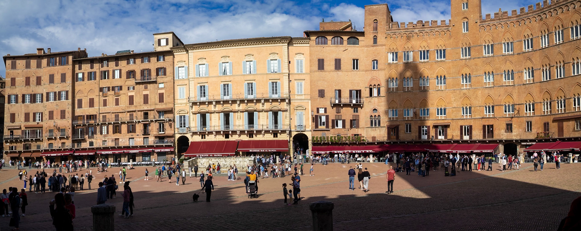 Panorama of Il Campo with the shadow of Torre del Mangia, Siena