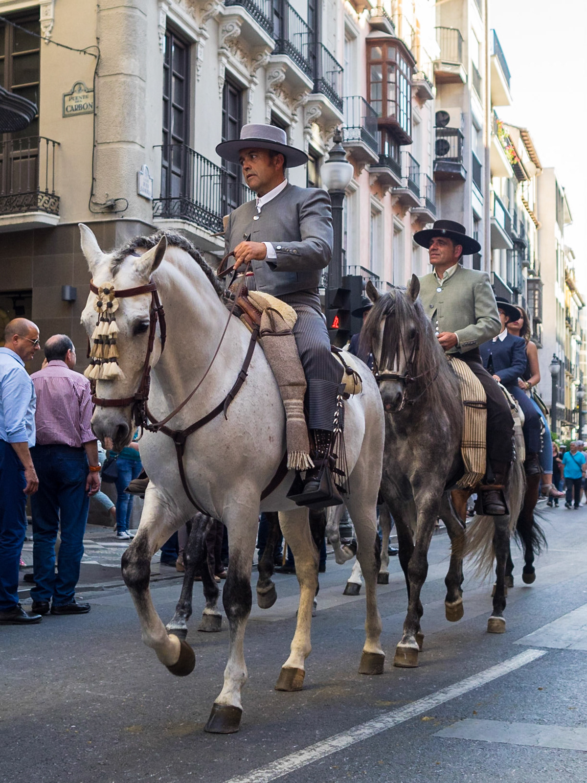 Street parade during the Las Cruces de Mayo in Granada