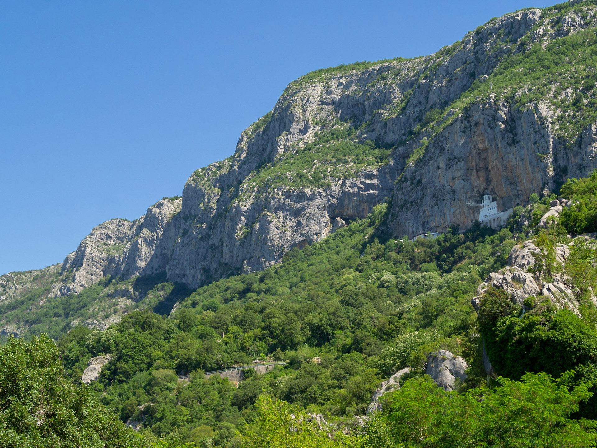 Ostrog Monastery high up in the rock of Ostroška Greda