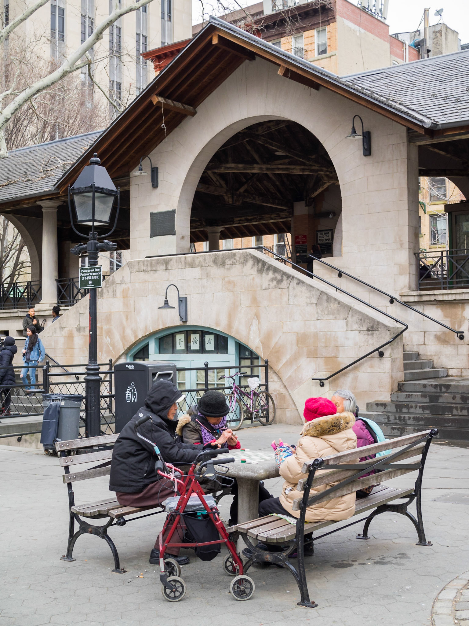 Chinese playing board games in the park in Manhattan Chinatown