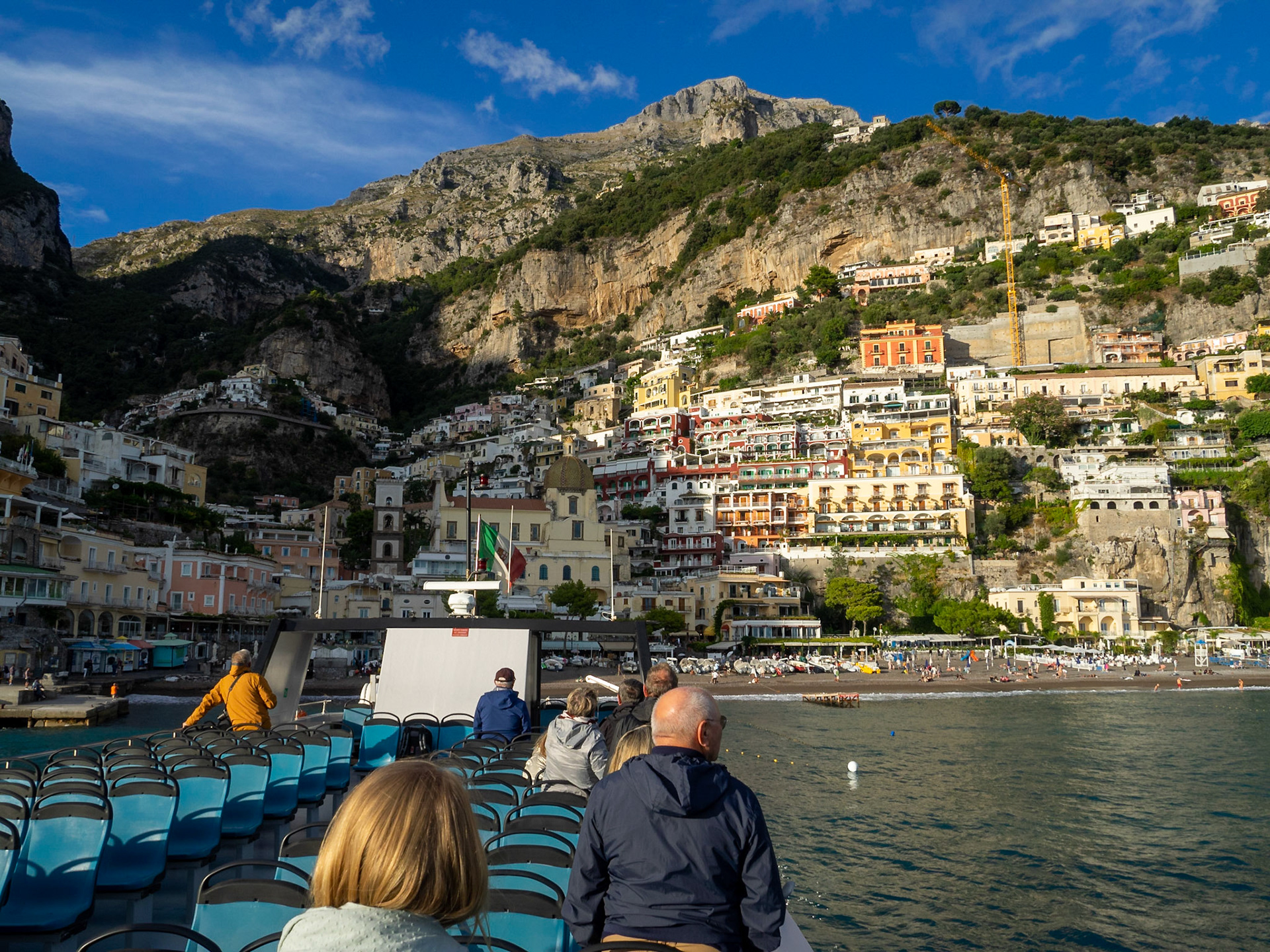 Tourists in a boat departing Positano