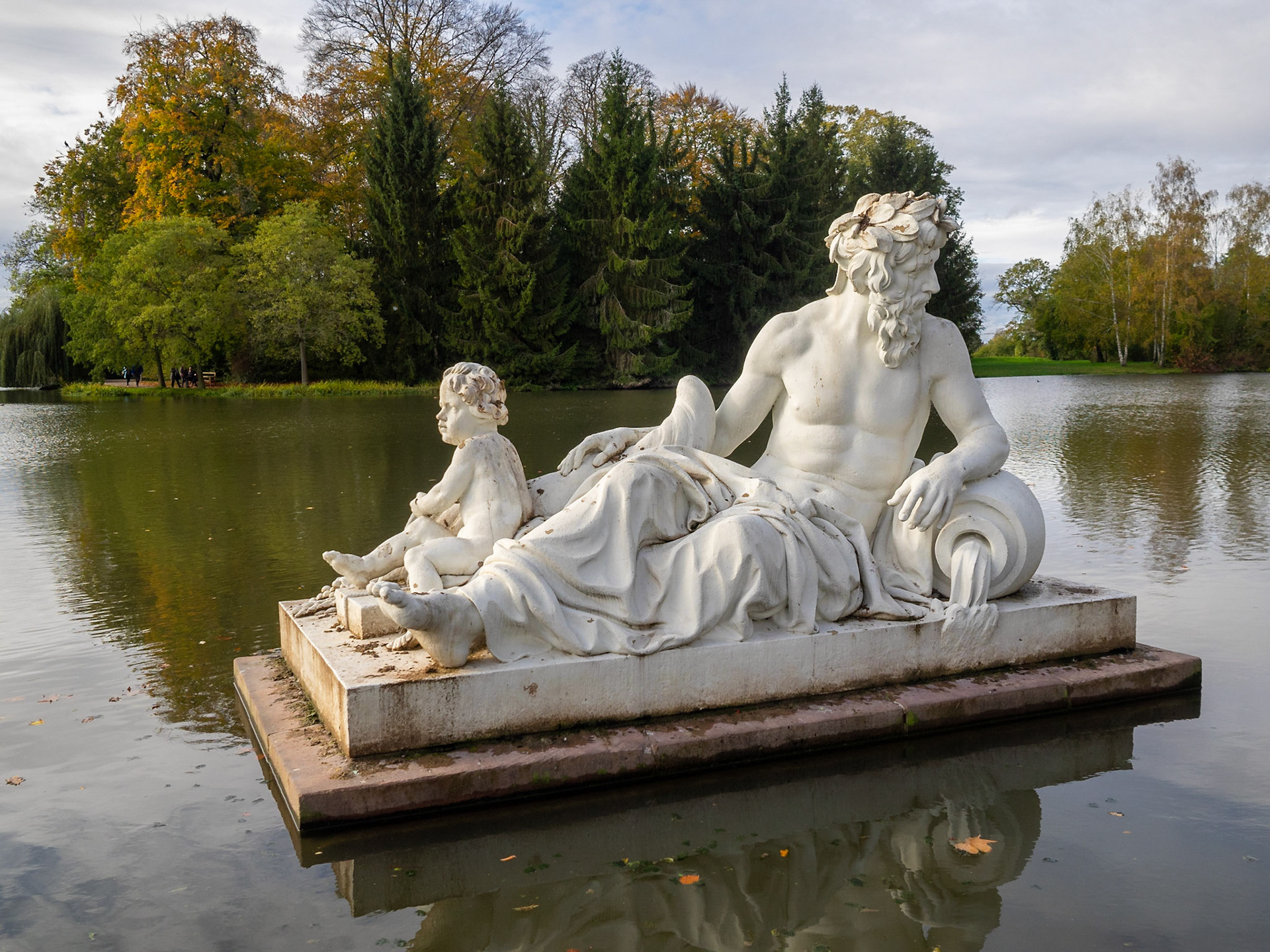 Schwetzingen Palace garden lake statue